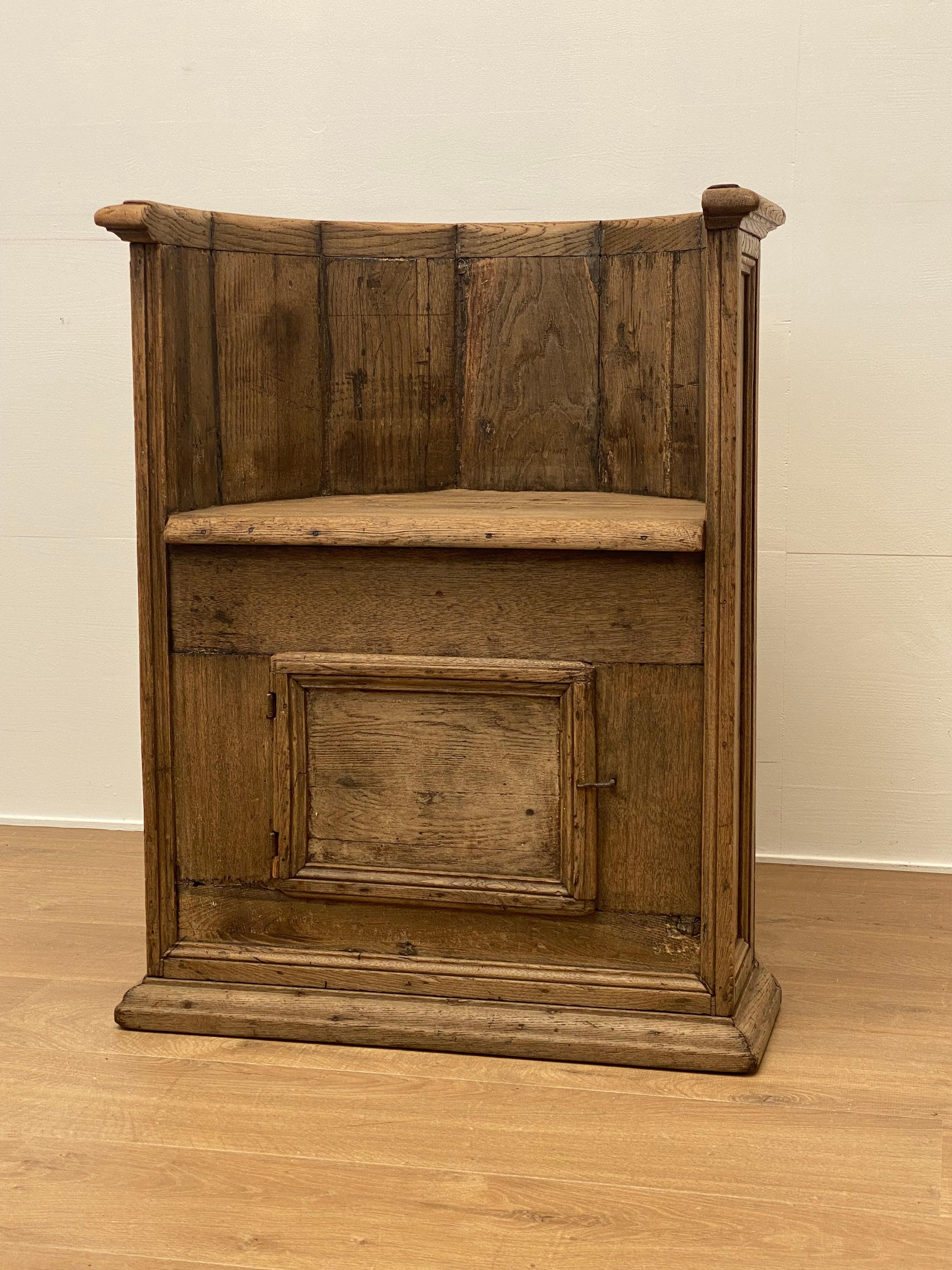 An exceptional antique Italian Chair from a church from the 17th Century,
the bleached Oak has a beautiful bleached patina and shine,
the chair has a very exceptional shape and there is a little door in the front of
the chair to store things,
very