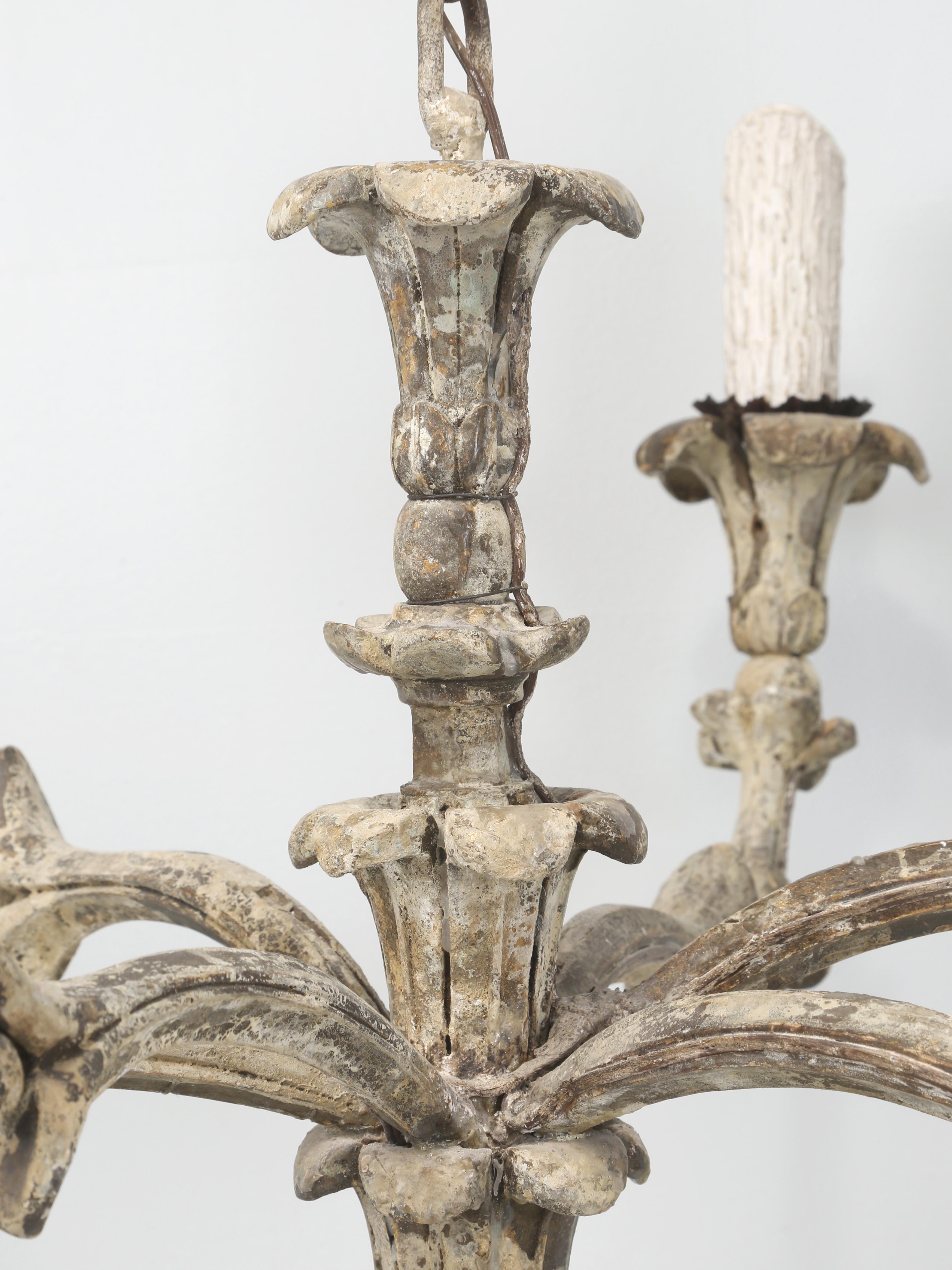 Antique Italian Chandelier Hand-Carved Wood in Very Old Paint and recently rewired. When we look at old Italian Painted items, such as this Antique Italian Carved Wood Chandelier I am always a bit suspect on what is and what is not real. Many times
