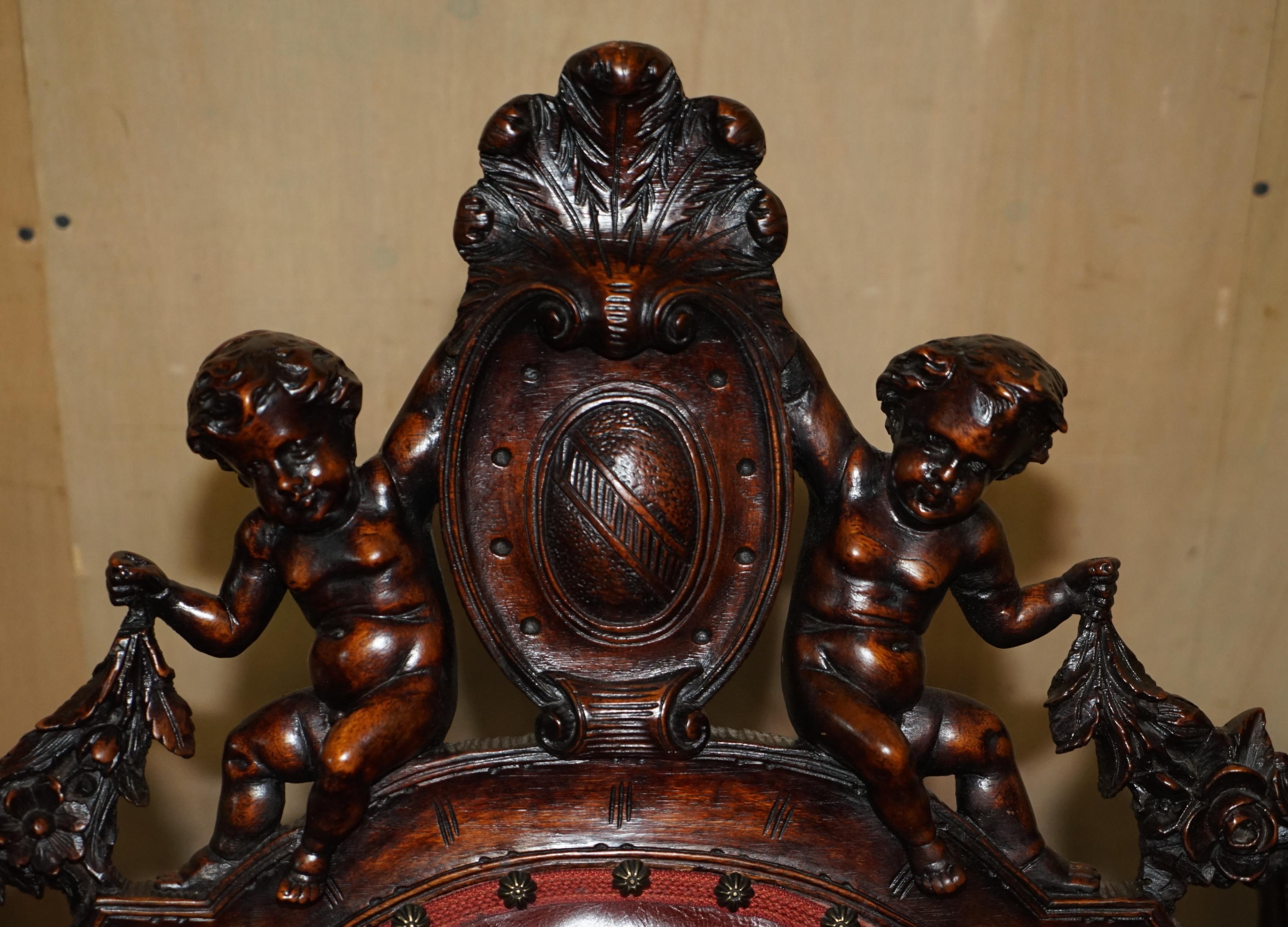 Leather ANTIQUE ITALIAN CIRCA 1850 HAND CARVED FRUITWOOD LEATHER ROCKiNG ARMCHAIR For Sale