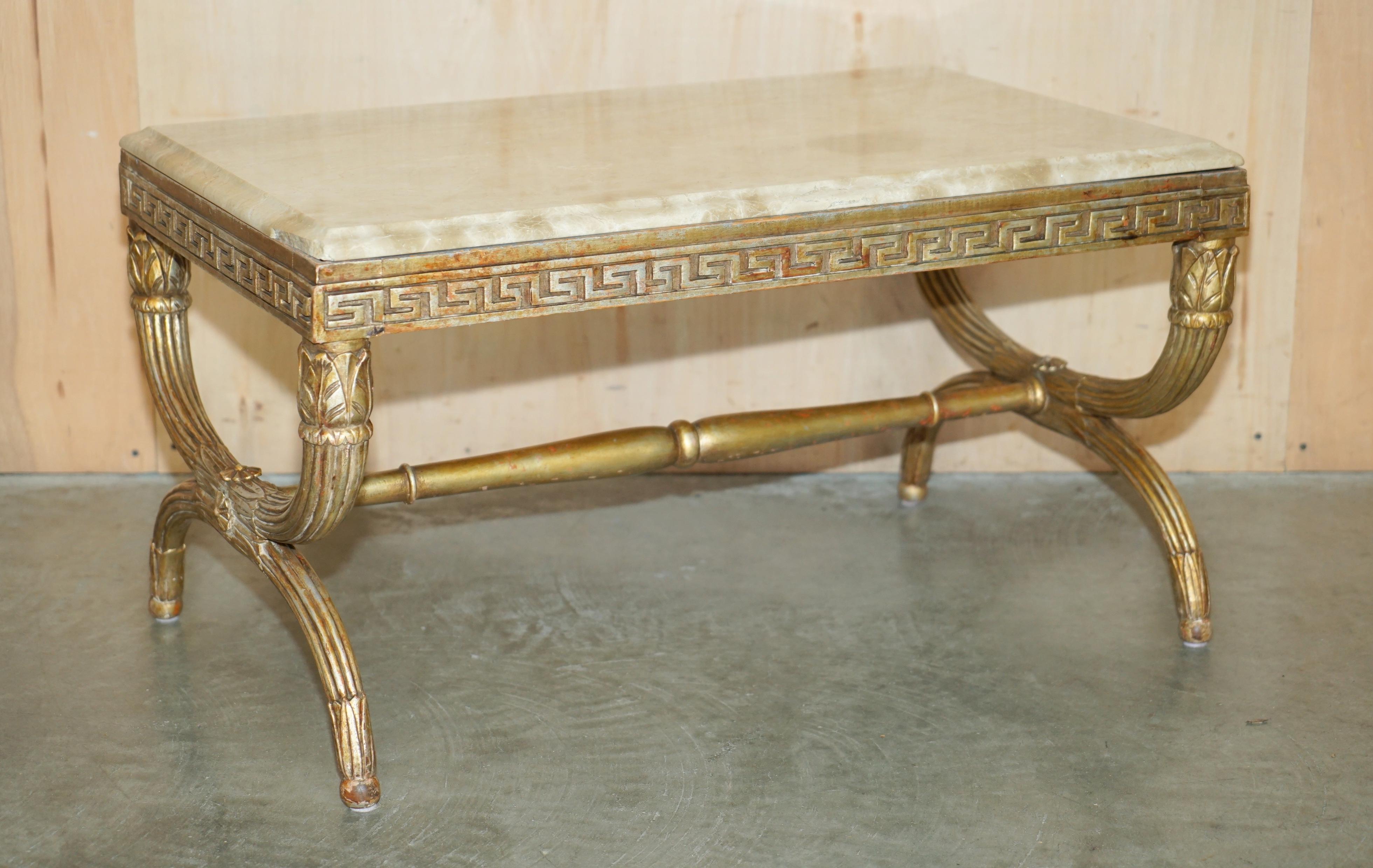 Royal House Antiques

Royal House Antiques is delighted to offer for sale this absolutely exquisite circa 1860-1880 hand made in Italy marble and hand carved giltwood coffee or cocktail table with thick marble top

Please note the delivery fee