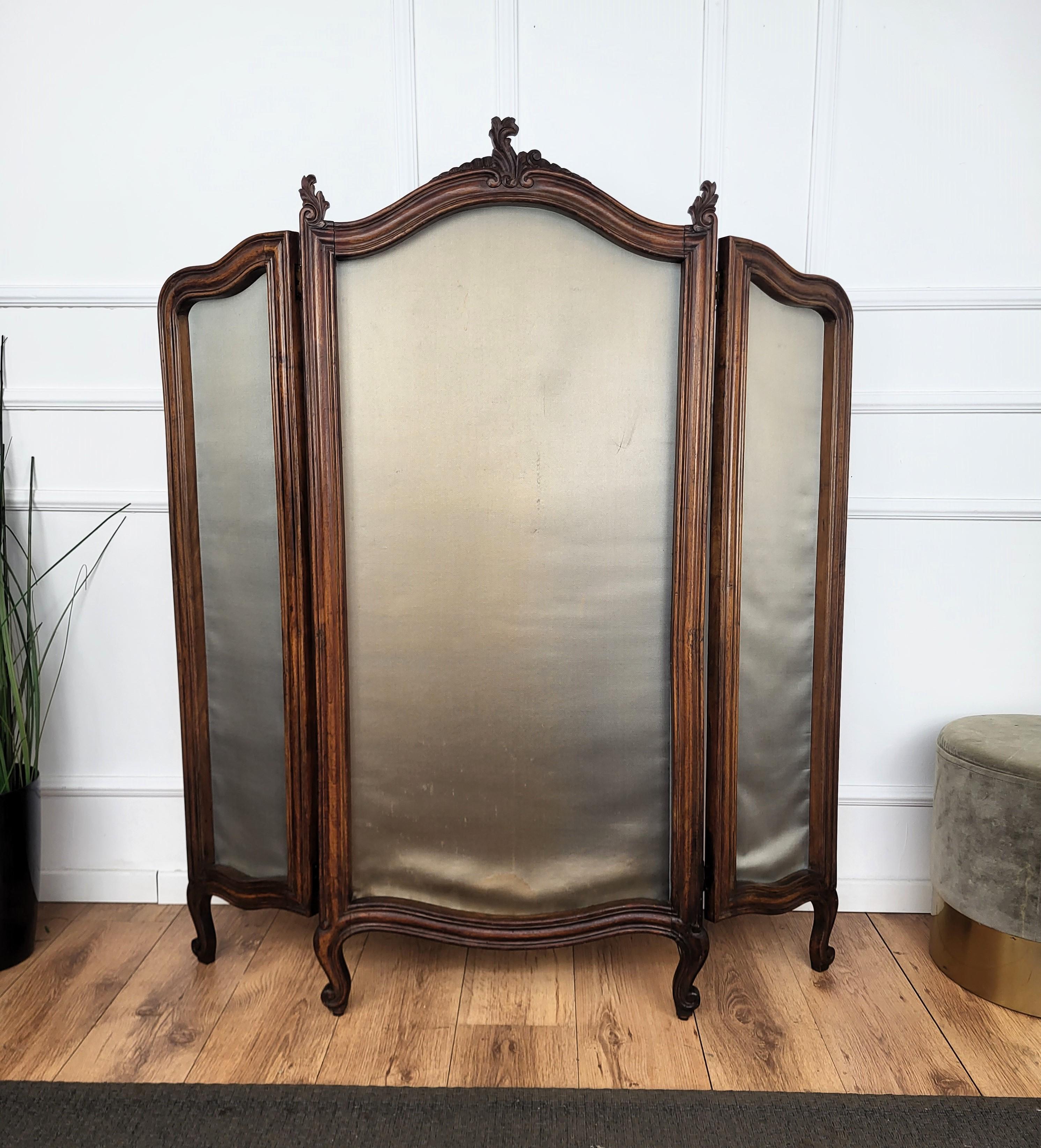 Beautiful classic Italian antique room divider or screen made by 3 greatly carved and detailed wood panels with fabric center. We didn't change the fabric center that can be personalized with either a simple full color choice or a more decorative