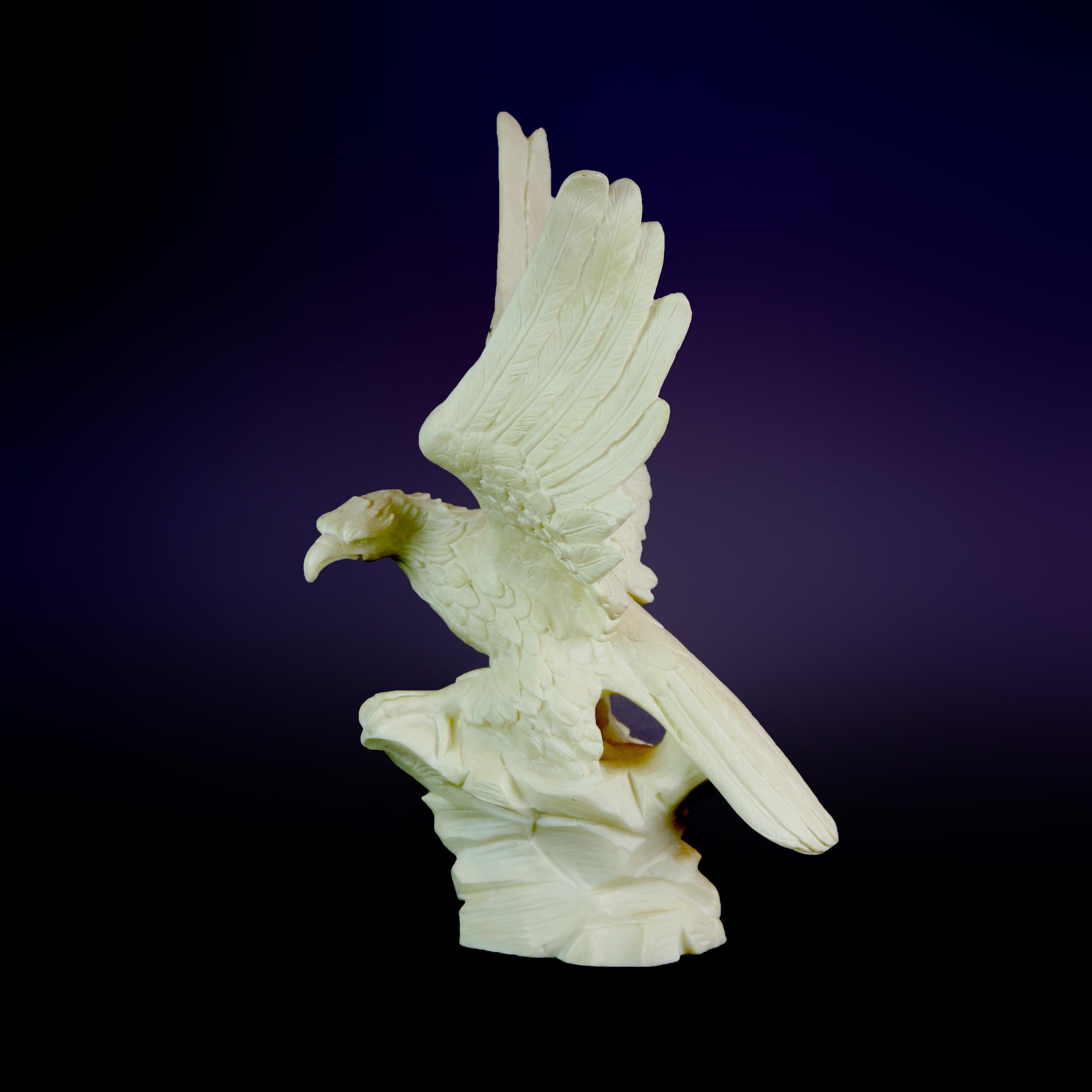 An antique Italian figural sculpture offers carved alabaster depicting an eagle taking flight, original label on base as photographed, 20th century.

Measures: 14.25