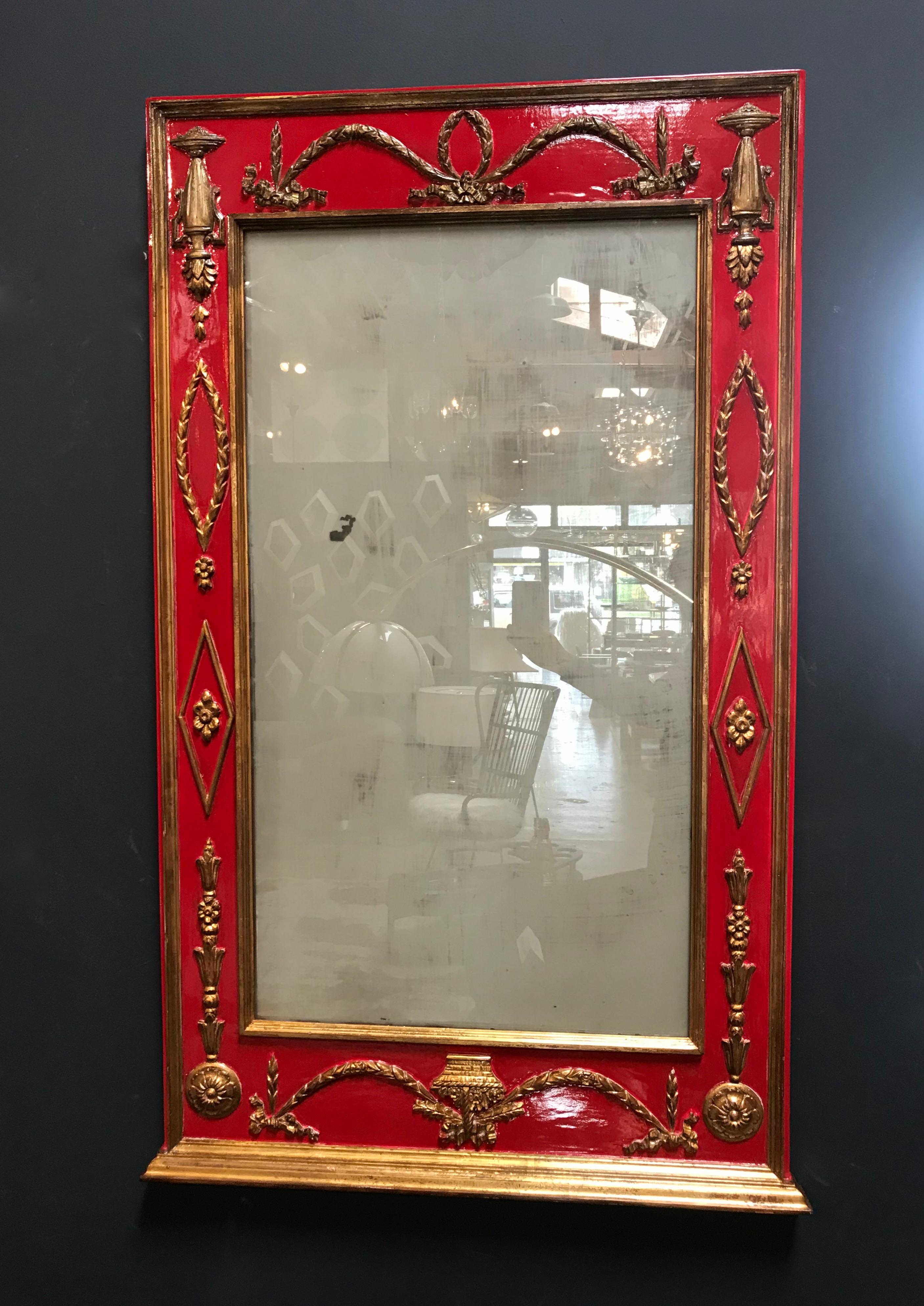 Stunning 19th century Italian fruit wood full neoclassical style mirror.
A large and impressive mirror with a carved cornice with leafy bands and rosettes underneath. The wide top frieze with a band of palmettes framed by scrolled brackets. The