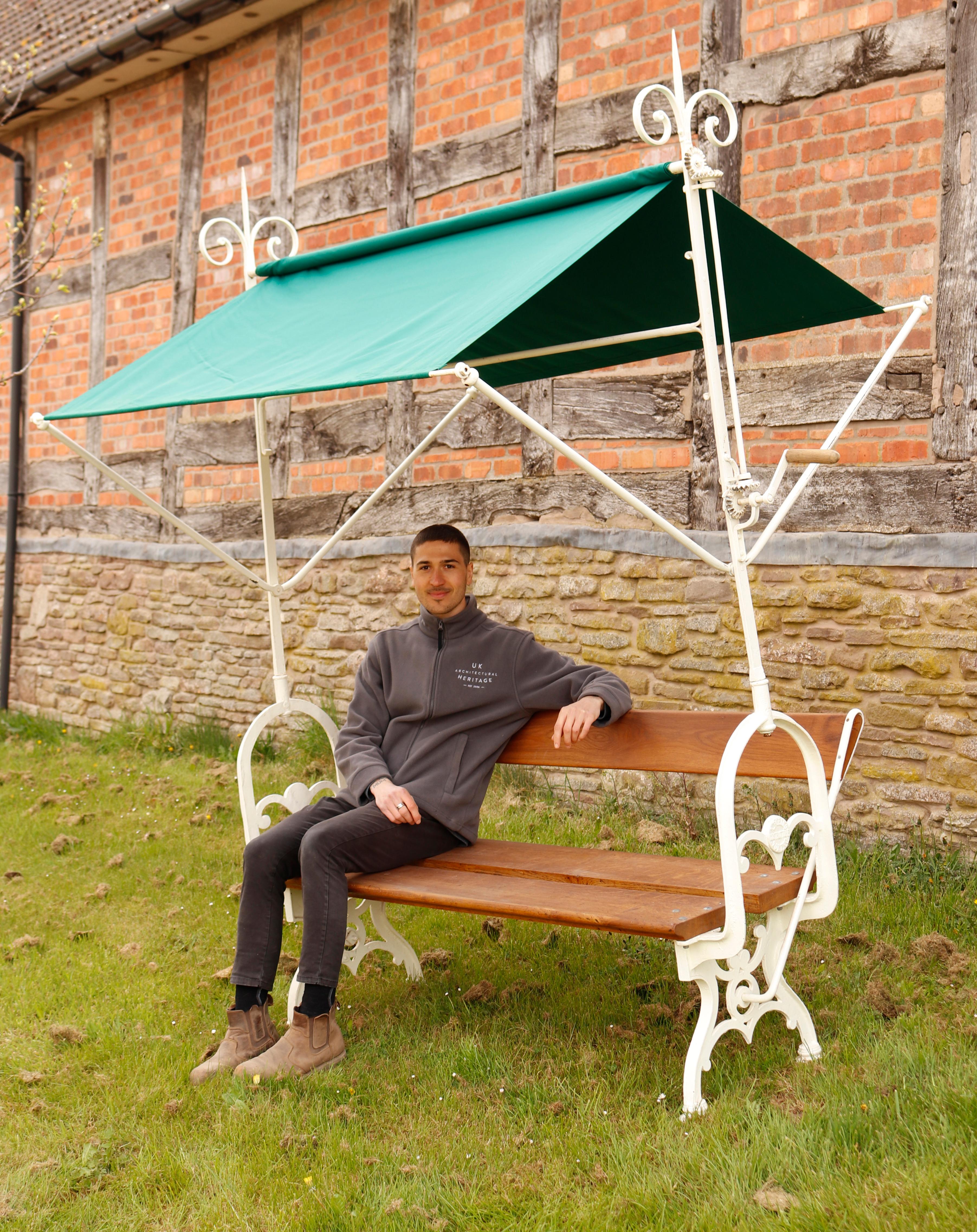 A very rare Italian garden bench with an adjustable canvas canopy and reversible back rest.
nk.