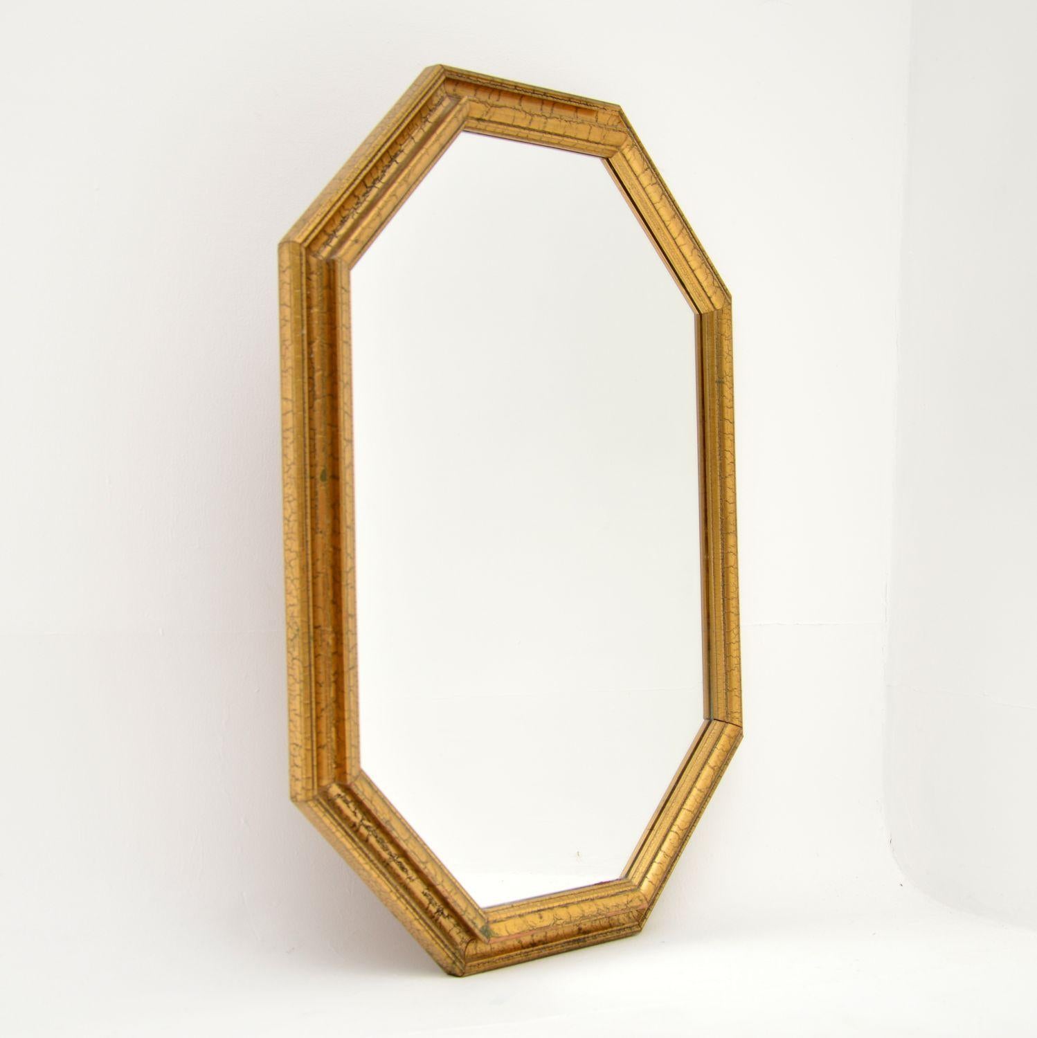 A beautiful vintage Italian gilt wood mirror. This dates from around the 1950’s.

It is of super quality and is a lovely size. The octagonal gilt wood frame has a wonderful slightly distressed finish.

The condition is excellent for its age,