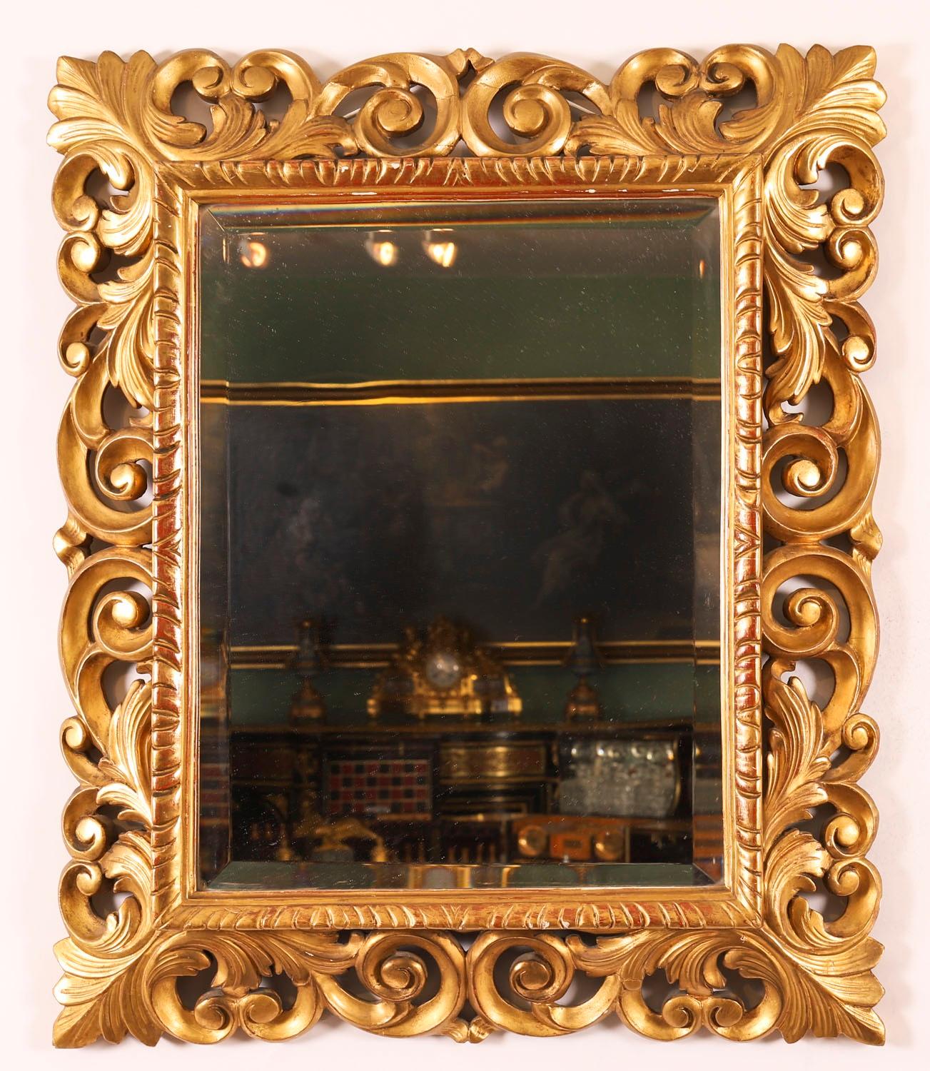 A superbly carved and highly decorative fine quality Italian Florentine giltwood  mirror, mid 19th Century in date.

This rectangular mirror consists of a superbly carved giltwood frame with a reeded border with scrolling acanthus foliate decoration