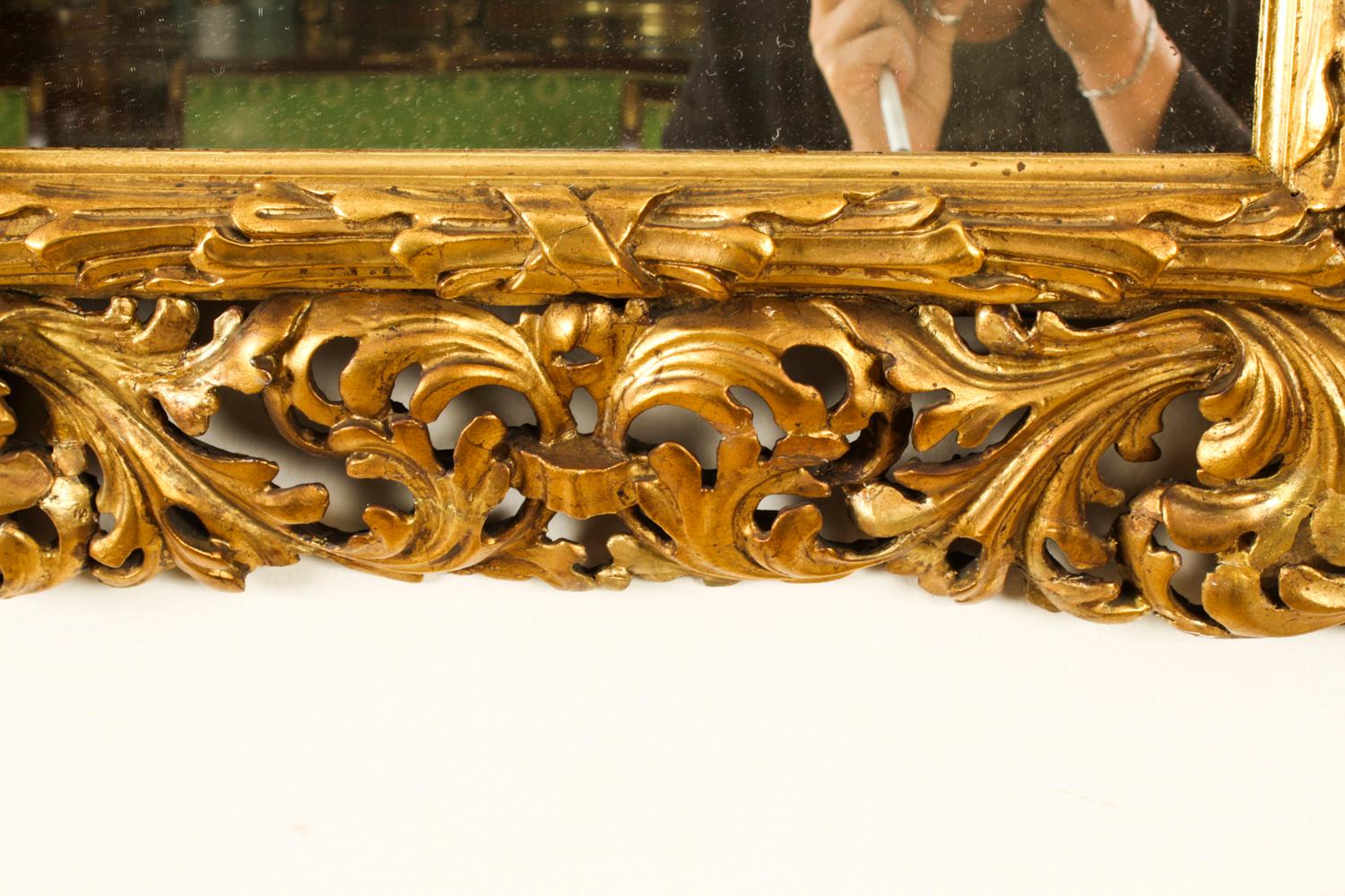 A superbly carved and highly decorative Florentine giltwood mirror, dating from Circa 1880.
 
This rectangular mirror consists of a superbly carved giltwood frame decorated with scrolling acanthus leaf decoration in high relief.
 
This mirror