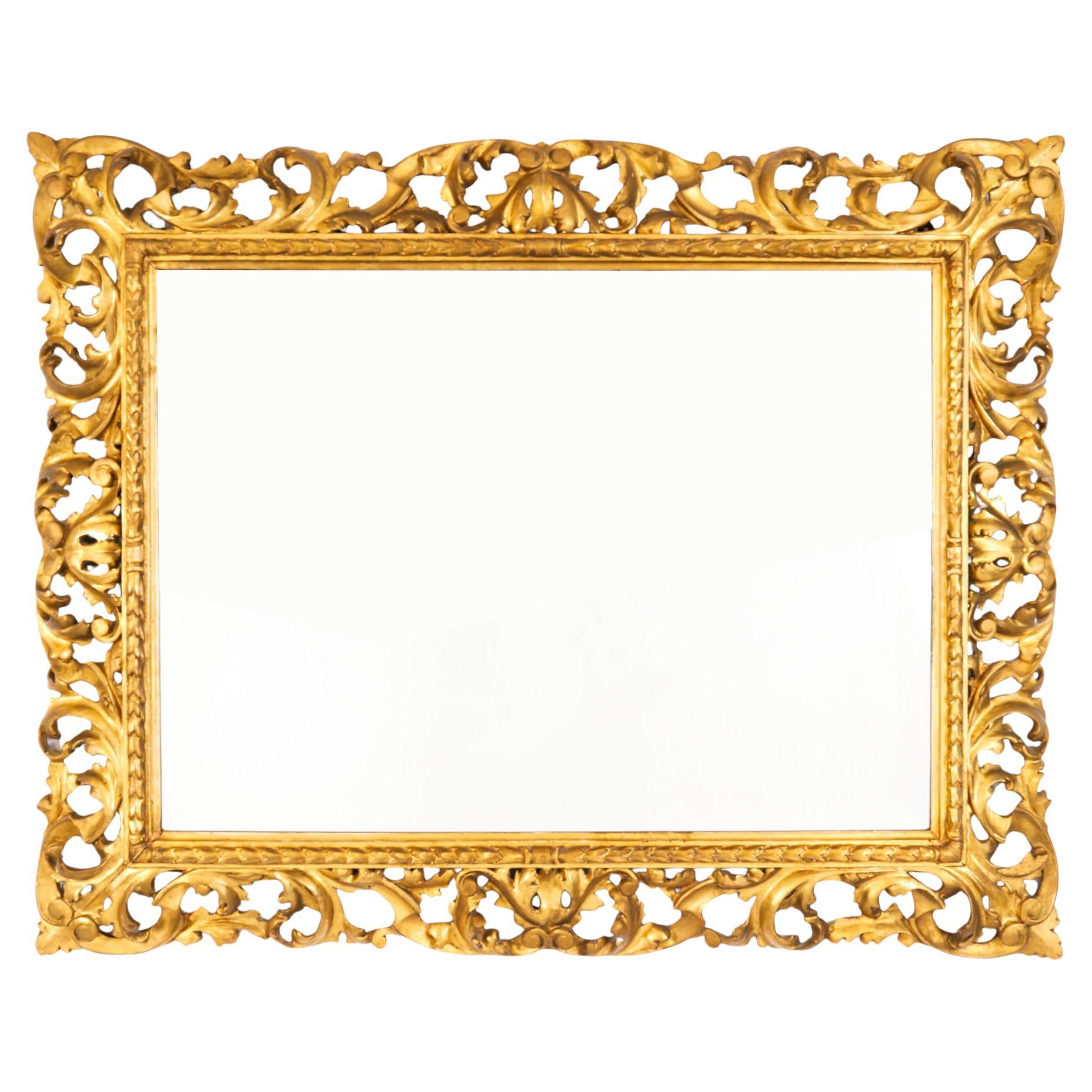 Antique Mirror italiano in legno d
orato sopra la mensola del camino del XIX secolo