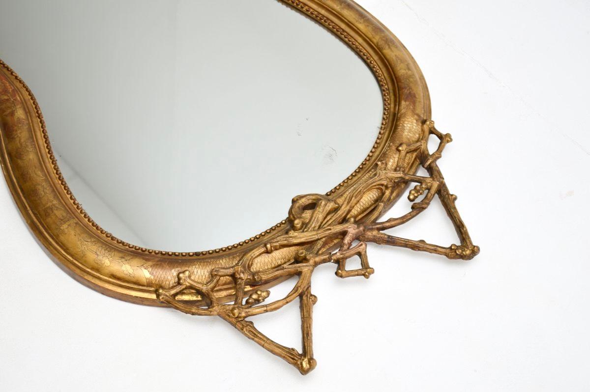 Mid-19th Century Antique Italian Giltwood Mirror For Sale