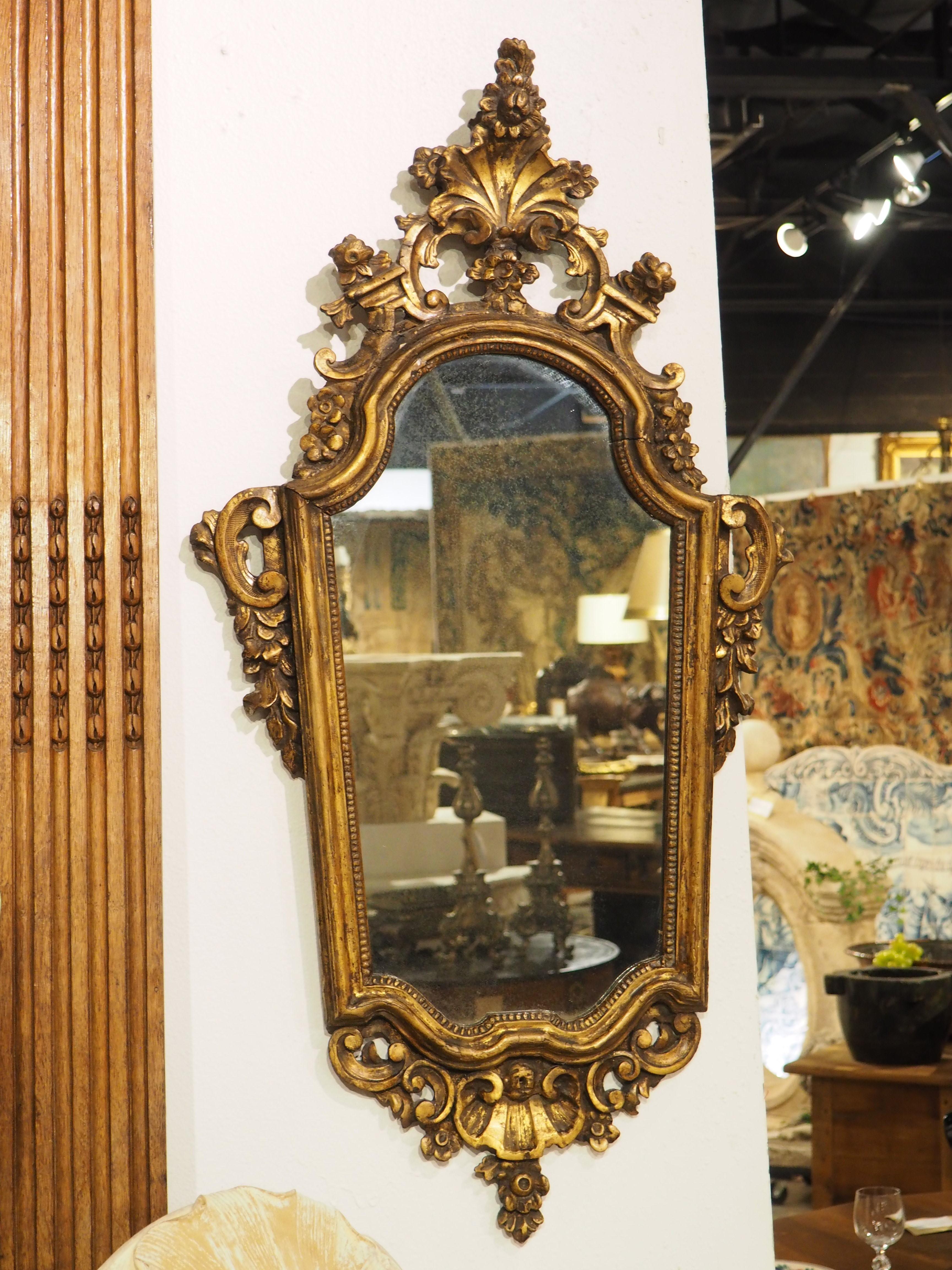 Although Rococo originated in France in the 1730s, the style was pervasive, spreading throughout Central Europe. One area noted for exceptional Rococo creations was northern Italy, in particular, Venice, where this giltwood mirror was hand-carved in