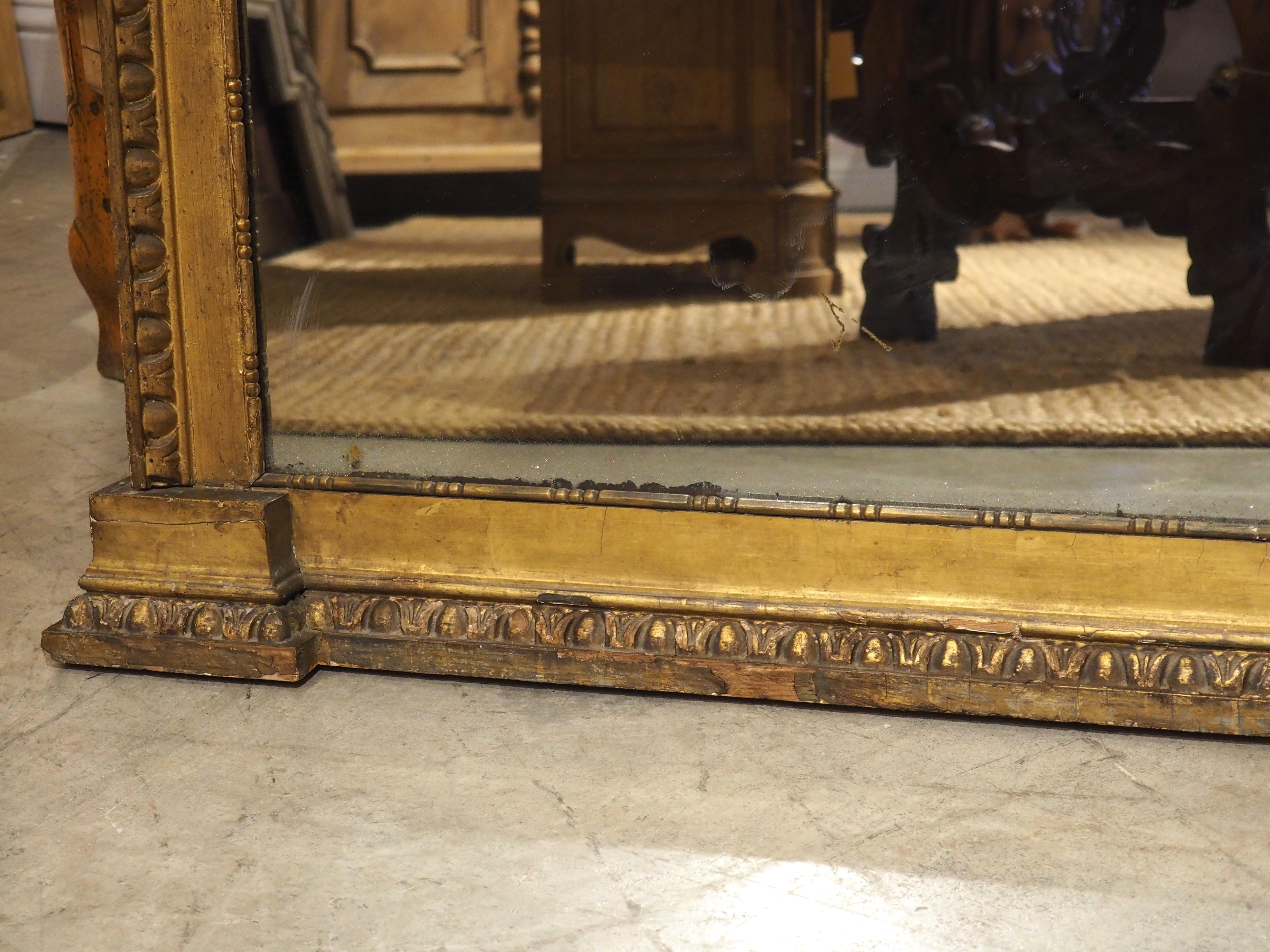 Hand-Carved Antique Italian Giltwood Trumeau Mirror with Harbor Scene Oil Painting, C. 1780 For Sale