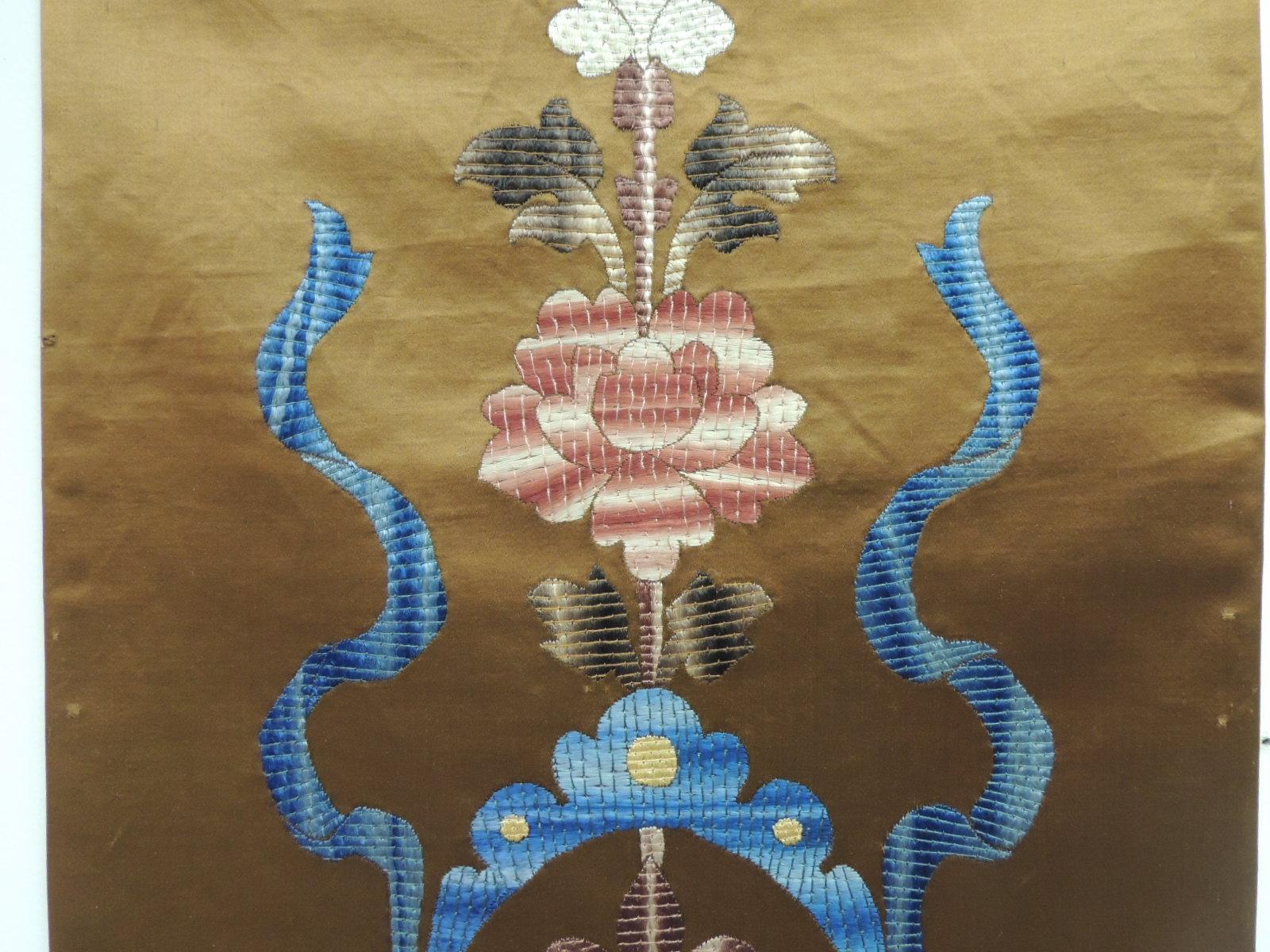 Antique Italian Gold and Blue Silk Floss Threads Embroidered Panel.
Depicting flowers and garlands. Silk on silk embroidery.
In shades of gold, blue, red, burgundy and brown with solid natural cotton backing.
Ideal as a wall hanging ot=r a long