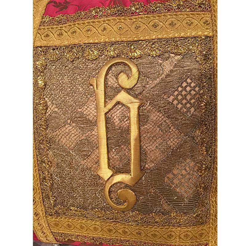 19th century Italian raised gold metallic applique hand sewn to rare 18th century French silver thread lace needlework. Framed with a cross pattern of 18th century Italian trim and gallons woven with genuine silver and gold metallic thread and