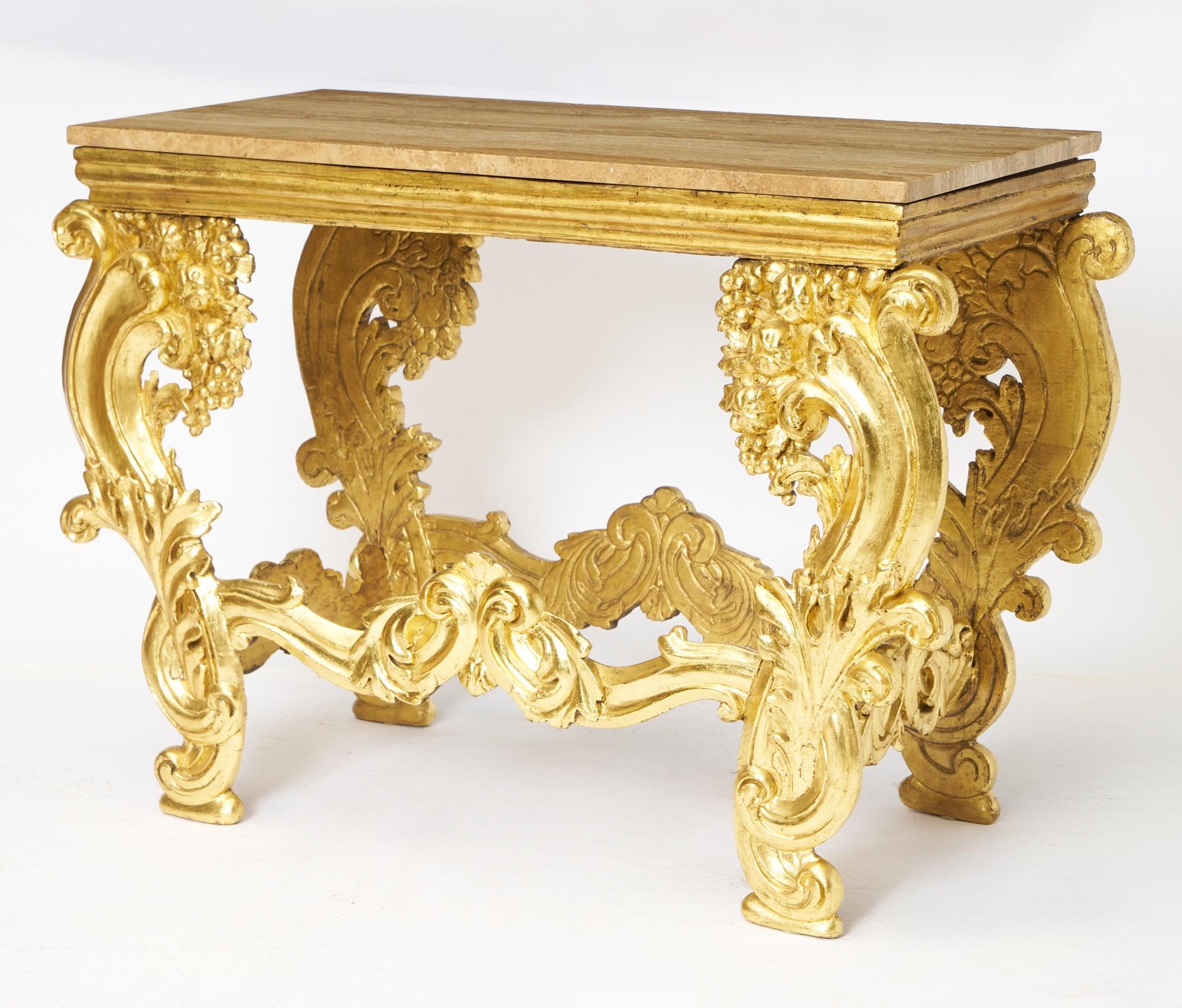 This exquisite 19th-century Italian console table showcases exceptional Rococo artistry with its hand-carved and gilt-painted wood frame topped by a richly veined marble surface. Crafted in Italy during the early to mid-1800s, this piece embodies
