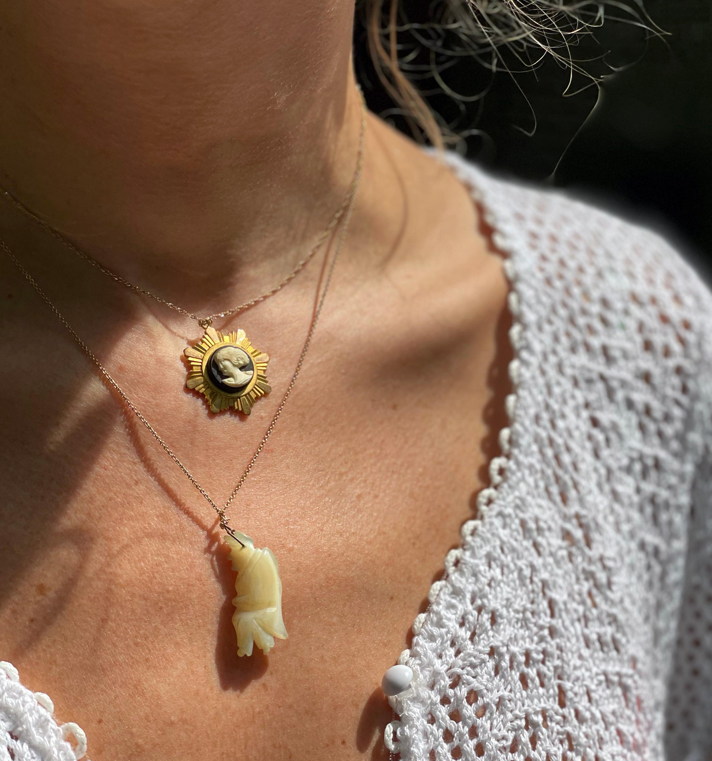 This antique mother of pearl Gobbo charm is a powerful talisman; if you're not familiar with Gobbo charms, they are thought to offer the same protection and good luck as the ubiquitous Italian horn charms.

Il Gobbo, (