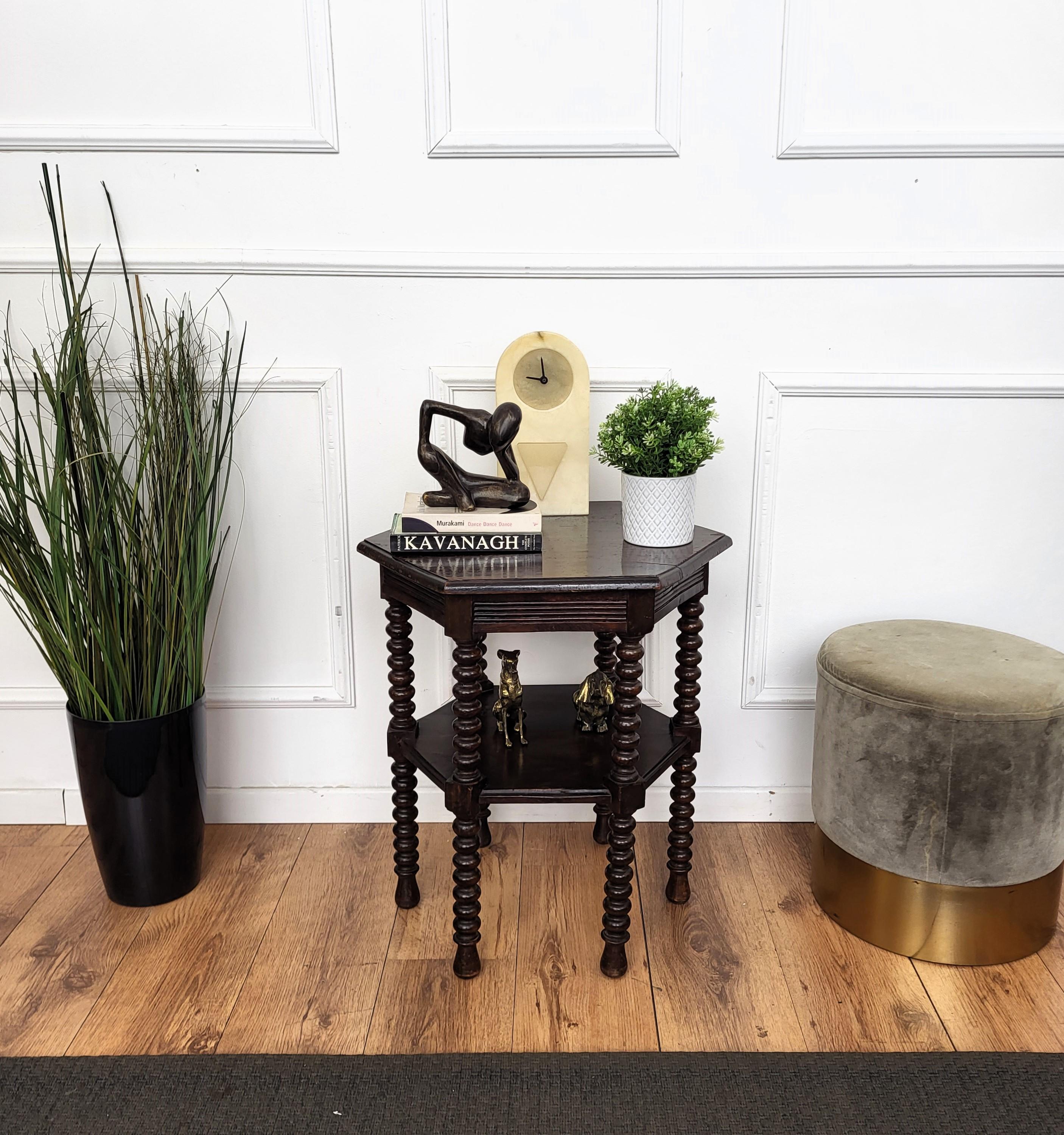 Beautiful antique Italian solid walnut side table or stool features hexagonal top with beveled edges over six beautifully bobbin turned barley twisted legs, connected to one another with central star shaped central stretcher.
 
This Italian walnut