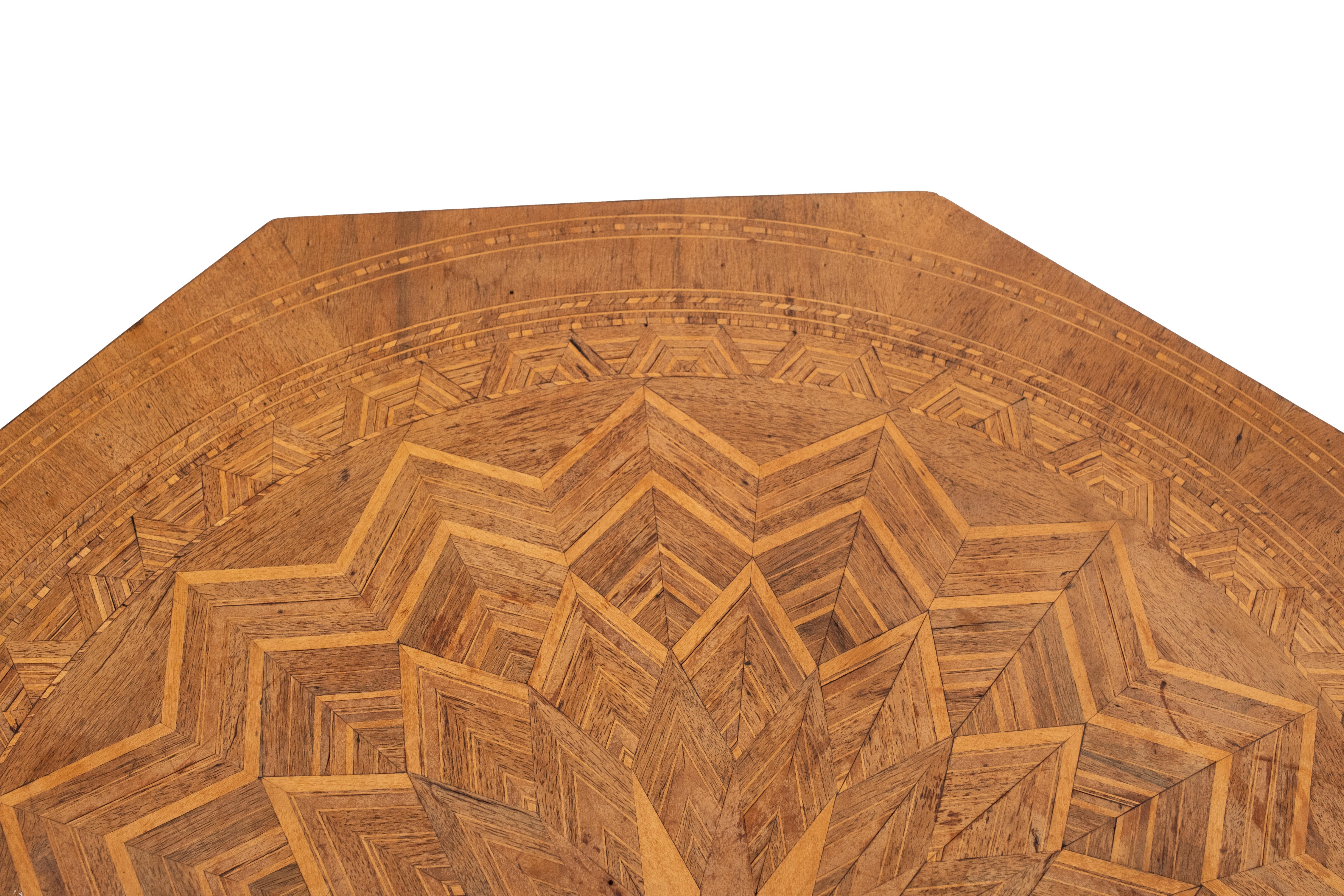 Fine example of inlay and geometric parquetry. Italian octagonal walnut table from Sorrento Italy 1880.
Fine craftsmanship. Even the legs are with inlay. Various kind off wood are used. This table is still 
in a good condition. No missing parts.
 