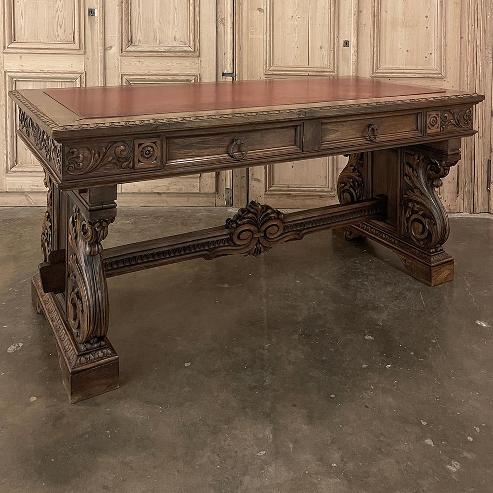 Antique Italian Louis XIV Neoclassical Walnut Desk with Faux Leather Top combines timeless architecture inspired by the ancient Greek and Roman civilizations, coupled with ornamentation derived from the Baroque period enjoyed by Louis XIV himself! 