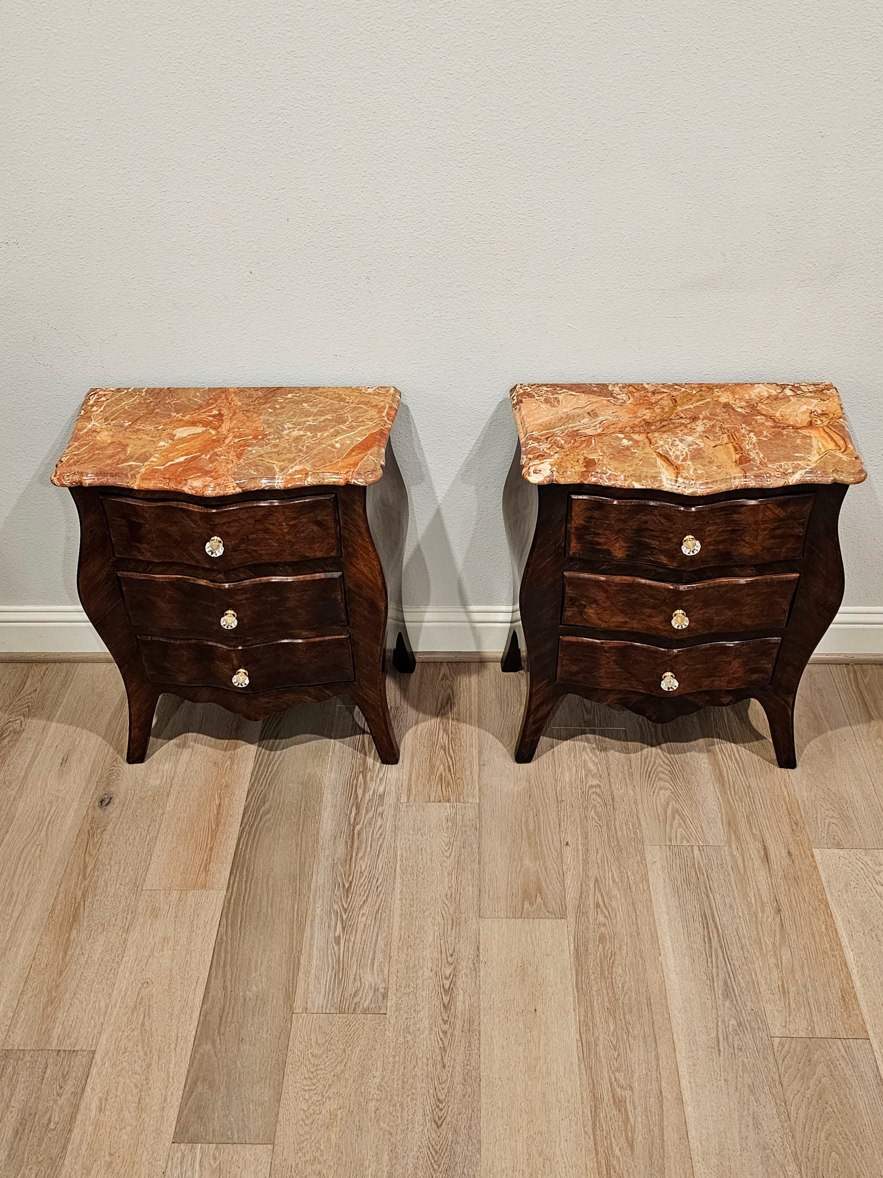 A pair of Italian antique matched kingwood nightstands. circa 1920

Finely hand-crafted in Italy in the early 20th century, high quality construction, craftsmanship and materials, featuring a stunning serpentine shaped breccia marble top with most