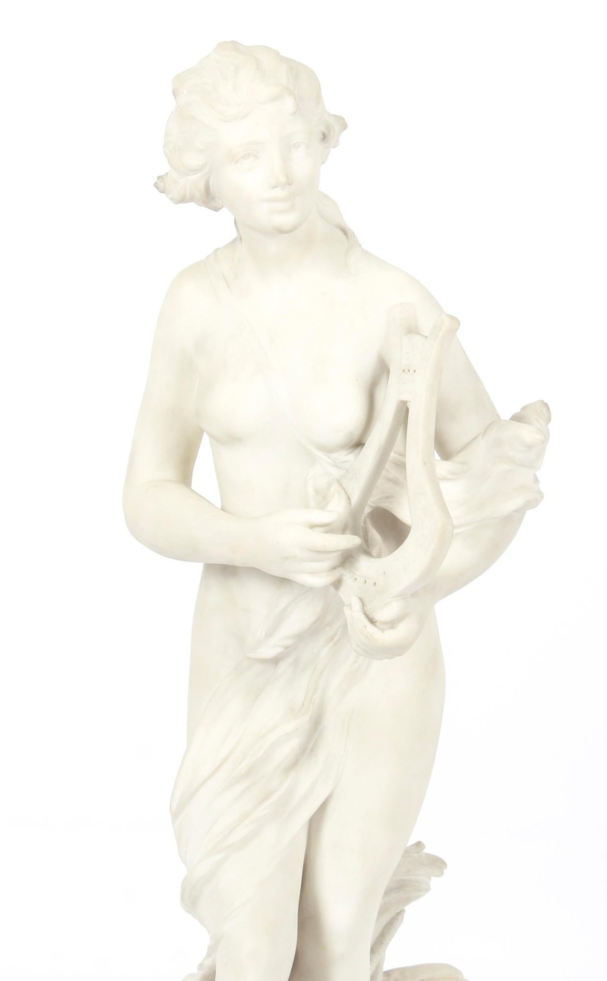 This beautiful Italian white Carrara marble sculpture of Terpsichore bears the signature of the sculptor, T.Dini and dates from the late 19th century.
 
This sensitively carved sculpture depicts Terpsichore, one of the nine muses and the goddess