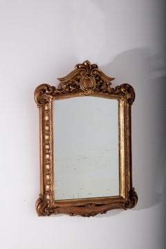 Antique Italian mirror in gilded wood