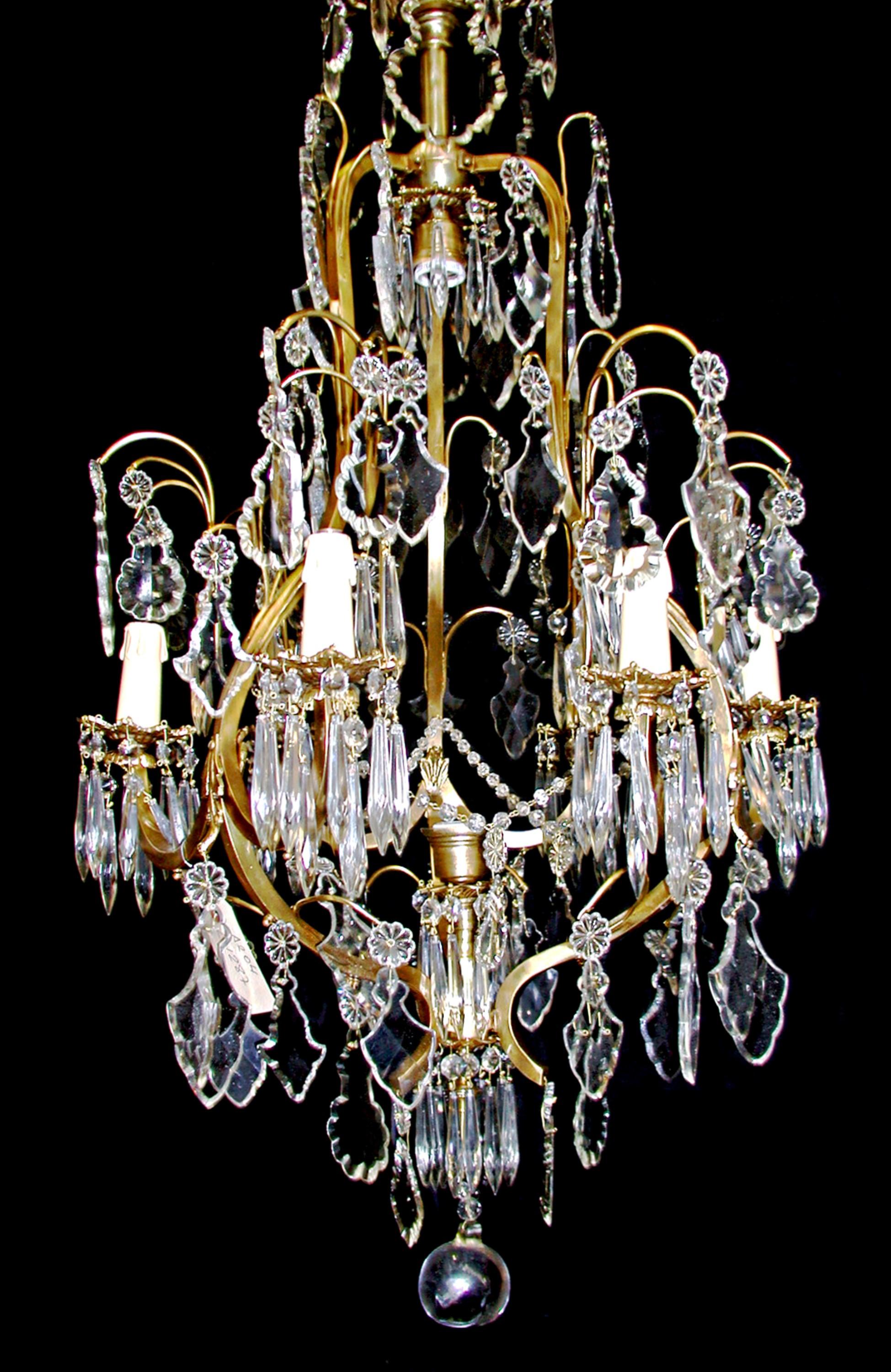 Cut crystal Italian style chandelier with six arms and a gilded gold brass frame. This light is cleaned and restored. Please specify the overall drop that is needed upon purchasing. Please note, this item is located in our Los Angeles location.