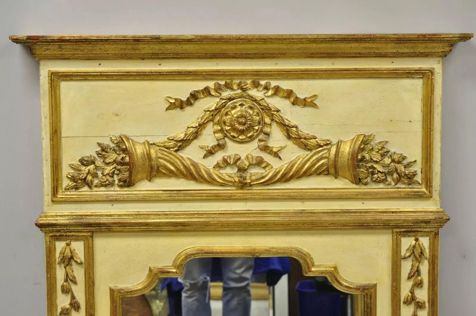 Antique Italian Neoclassical Gold Giltwood Large 58x40 Trumeau Wall Mirror. Item features a solid wood frame, distressed finish, nicely carved details, original stamp, quality Italian craftsmanship, great style and form. Circa Early 20th Century.