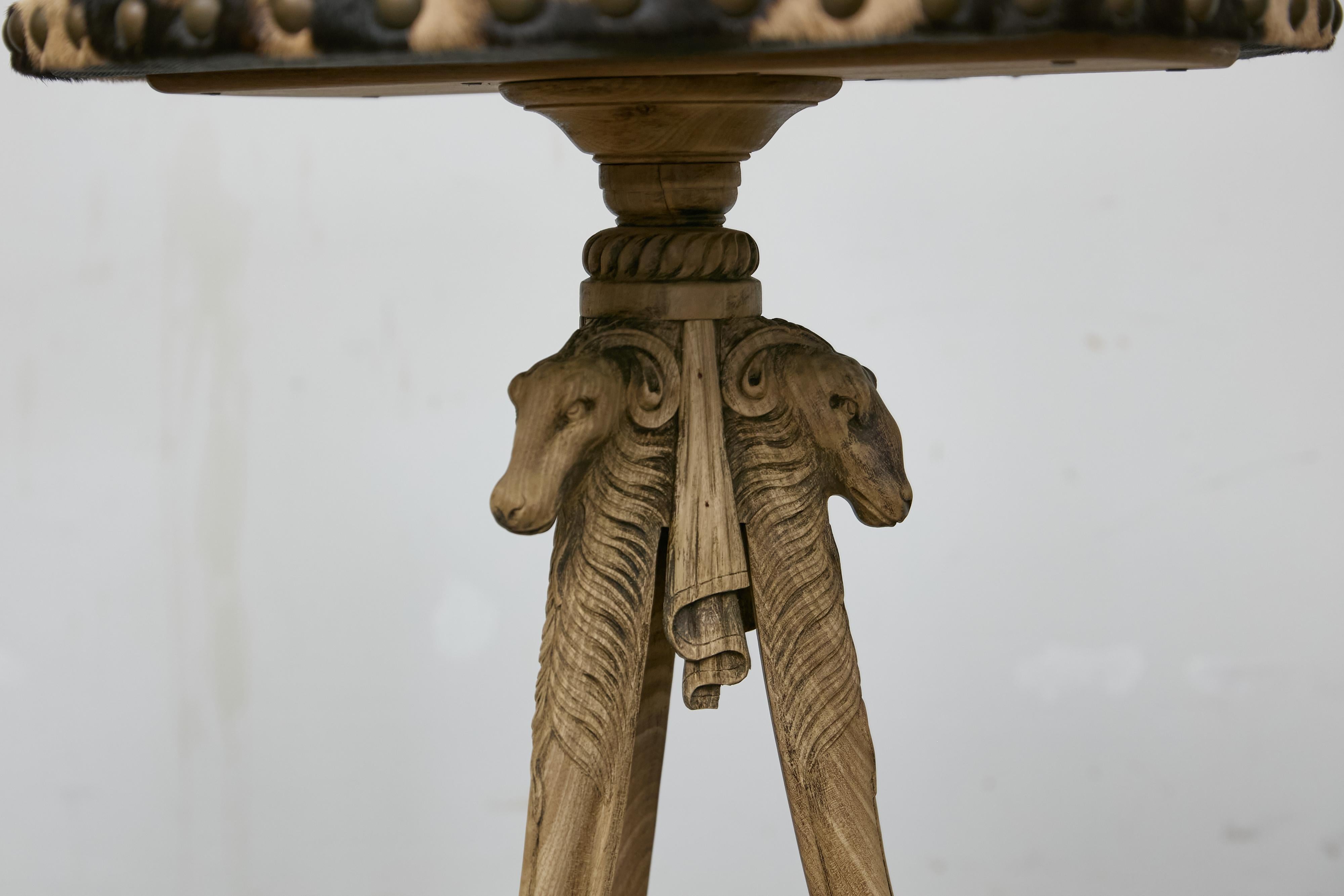 Bleached Antique Italian Oak Tripod Table with Zebra Hide Top and Ram’s Head Carvings