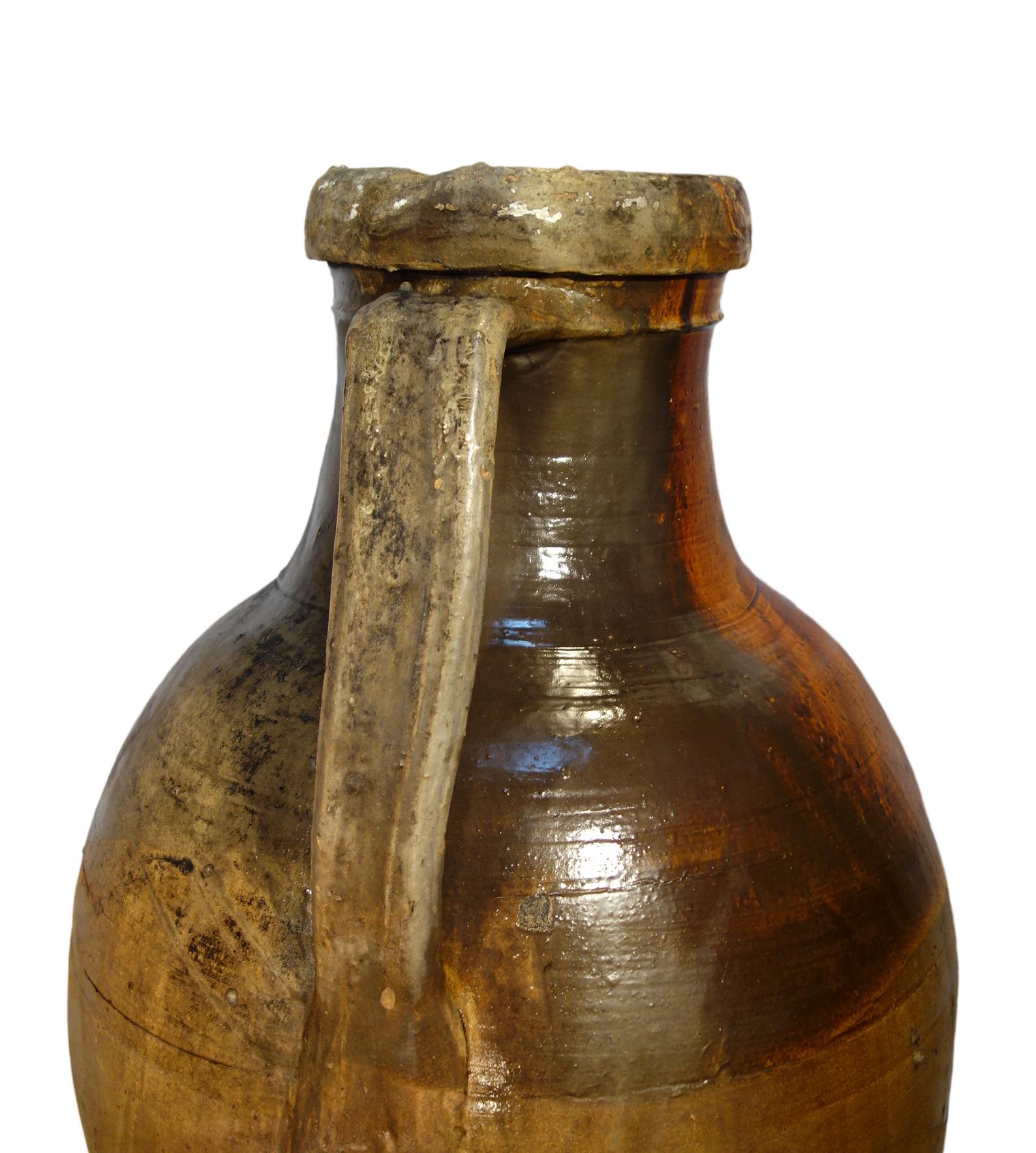 Antique Italian Orcio Puglia #4, Colossal Terra Cotta Jar, Ochre and Umber Glaze In Distressed Condition For Sale In Encinitas, CA