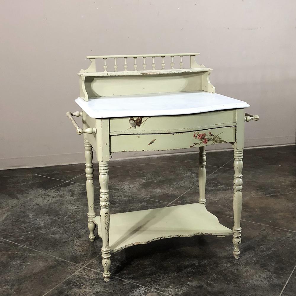 Antique Italian painted washstand, vanity is a delightful example of Belle Époque charm featuring superlative architecture and its original hand-painted finish embellished with original works of art for a truly unique effect! Marble-top and towel