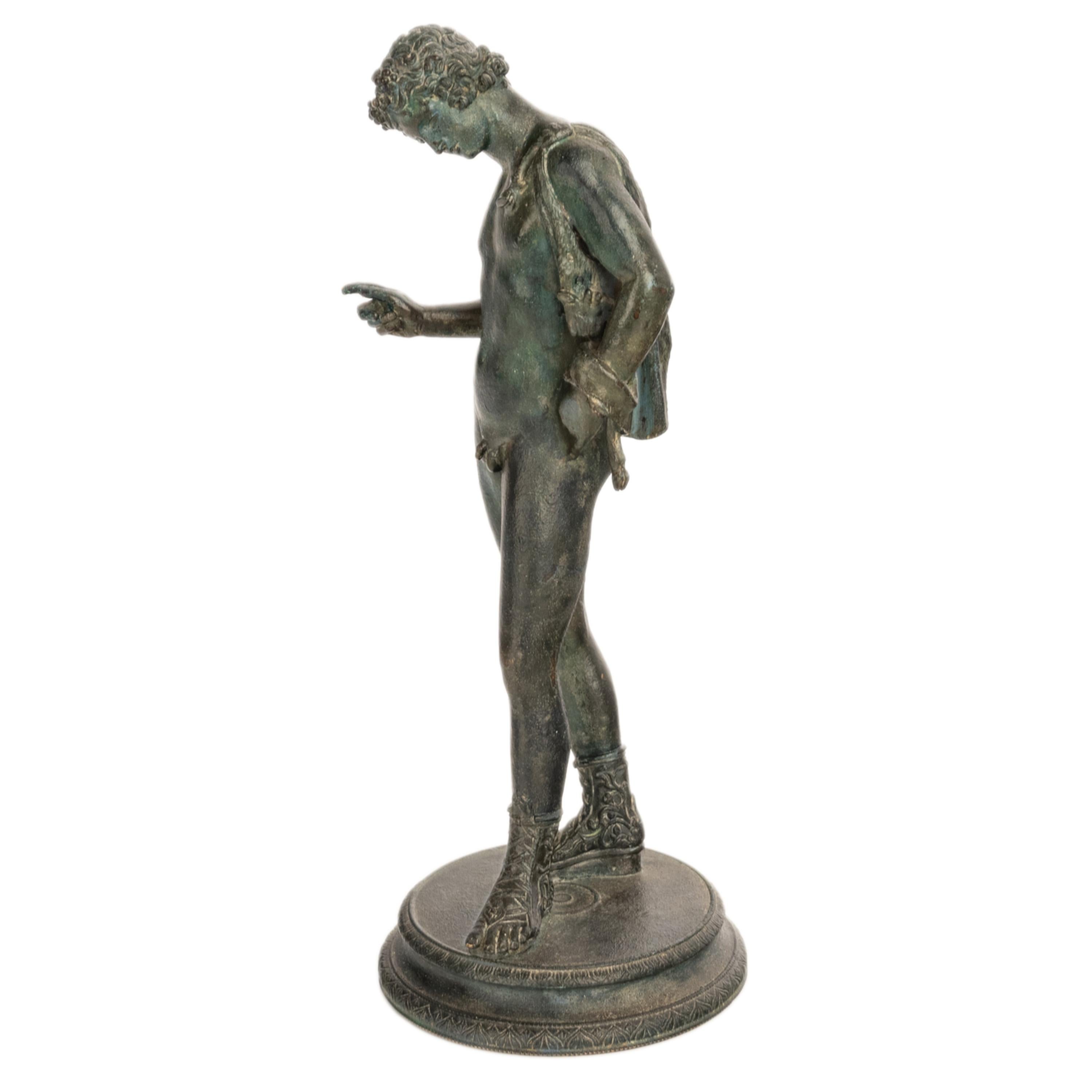 Antique bronze statue of Narcissus by Michele Amodio (1817-1913) Italy, 1862.

Amodio was an Italian artist and foundry owner active in the mid to late 19th century. This Neapolitan bronze figure of Narcissus was cast by the lost wax method after a