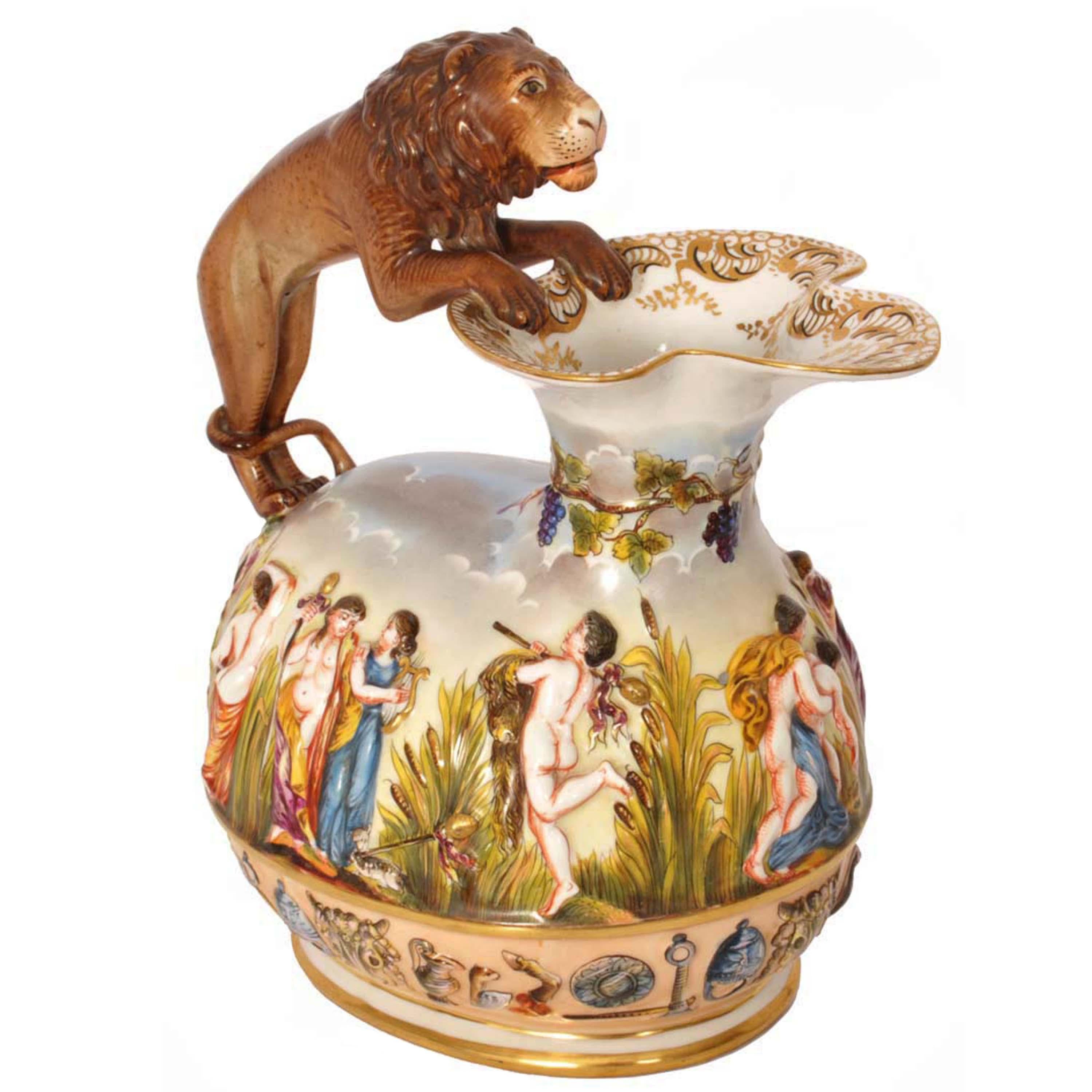 An unusual antique Italian porcelain pitcher jug in the Neoclassical style, Capodimonte, Circa 1880.
The jug modelled with a fabulous lion handle, a pouring spout to the front and decorated with a band of vine and grapes around the neck. The base
