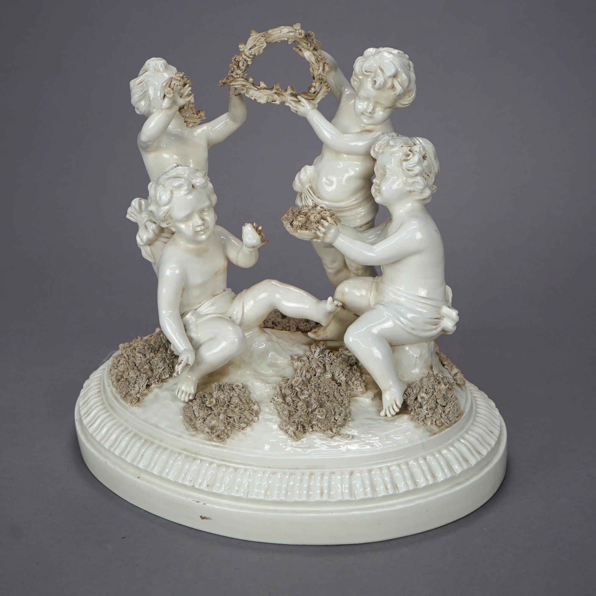 An antique Italian figural grouping offers porcelain construction with four putti in outdoor setting, Italy on base as photographed, circa 1900

Measures- 12''H x 12.5''W x 9.5''D.