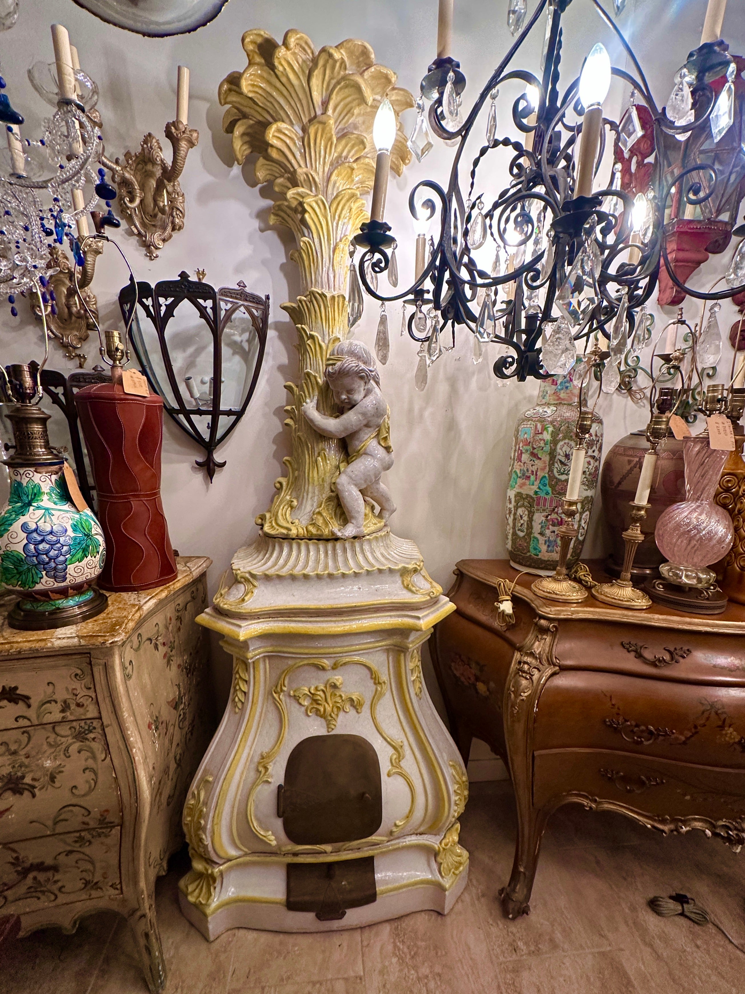 A circa 1920's  Italian porcelain stove.

Measurements:
Height: 62