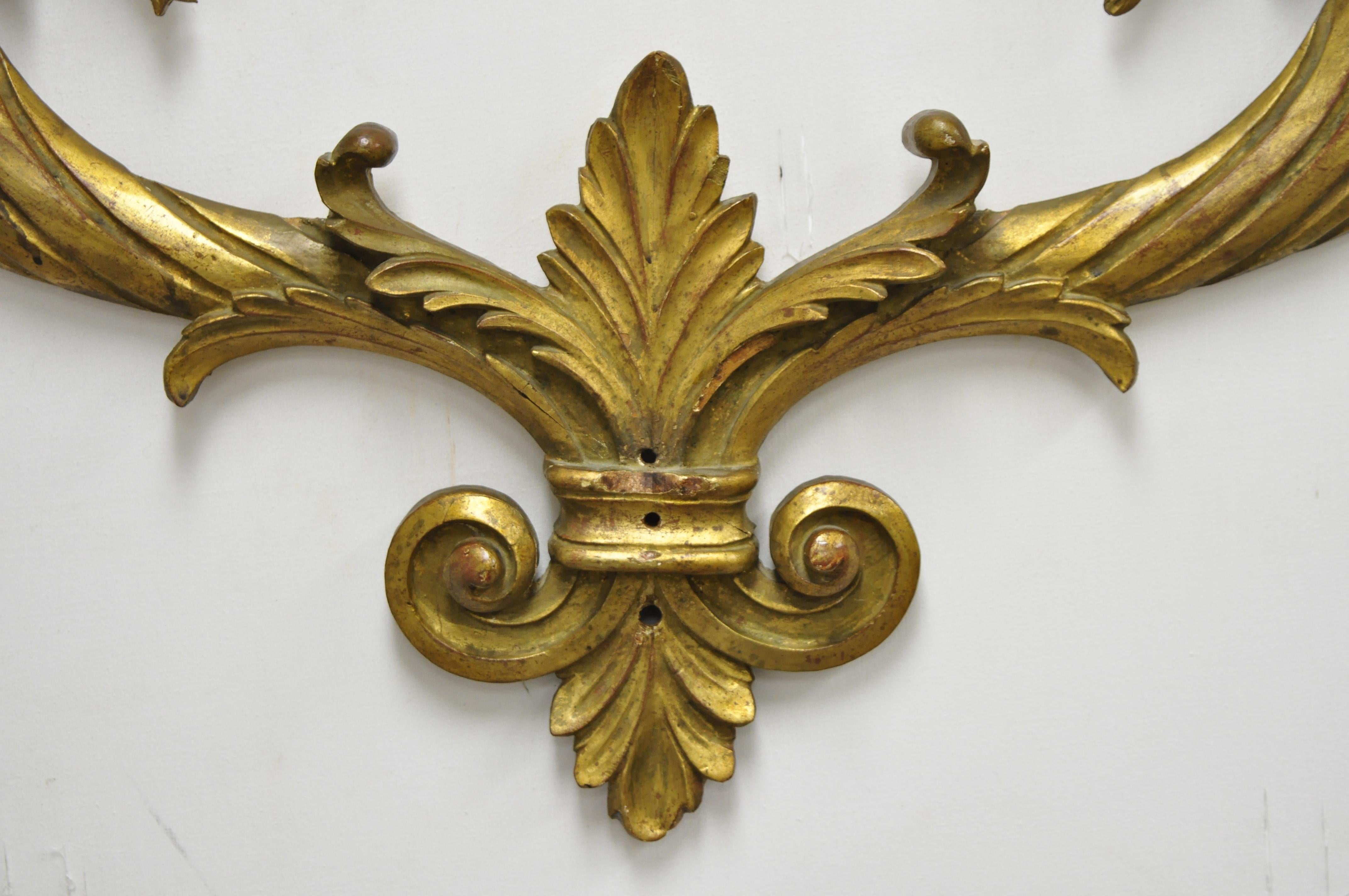 Antique Italian Regency Florentine carved wood cornucopia decorative wall art. Item includes a solid wood carved form, cornucopia design, gold gilt finish, leafy scrollwork, very nice antique item, great style and form, circa early 20th century.