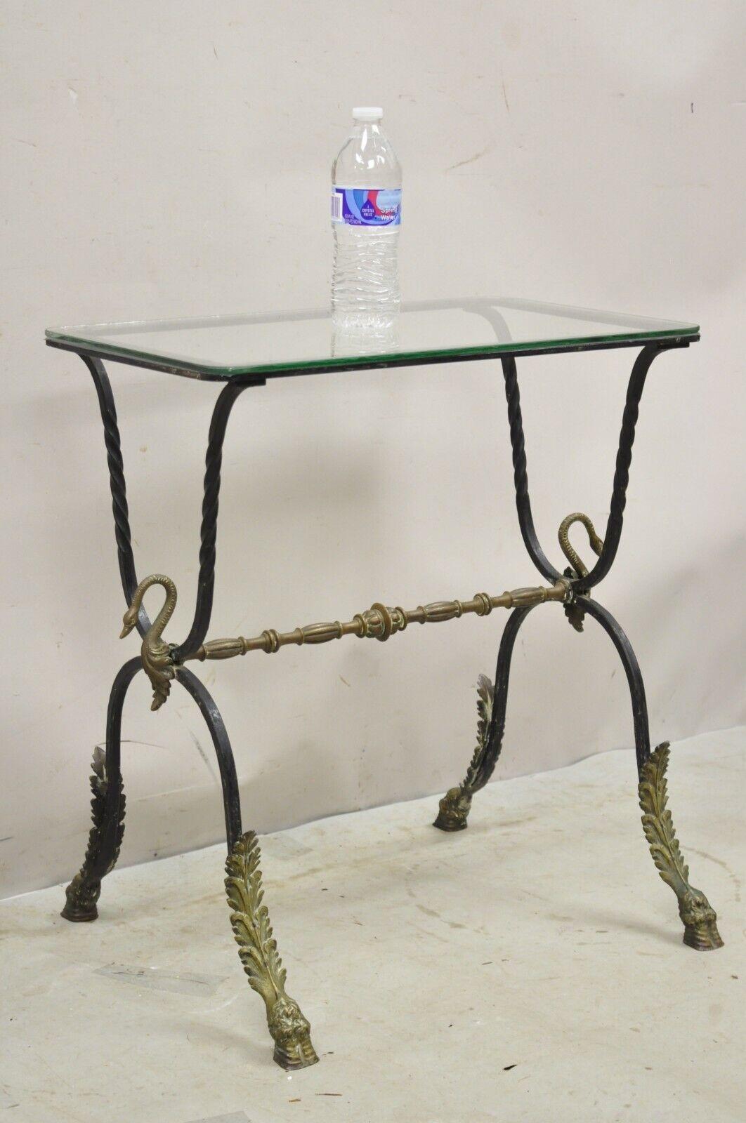 Antique Italian Regency Neoclassical Wrought Iron and Bronze Swan Side Table. Item featured is a nice small size, bronze swans and hoof, glass top, very nice antique item. Circa  Late 19th Century. Measurements: 23.5