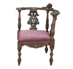 Antiguo sillón italiano renacentista barroco tallado Faónix Querubín de esquina