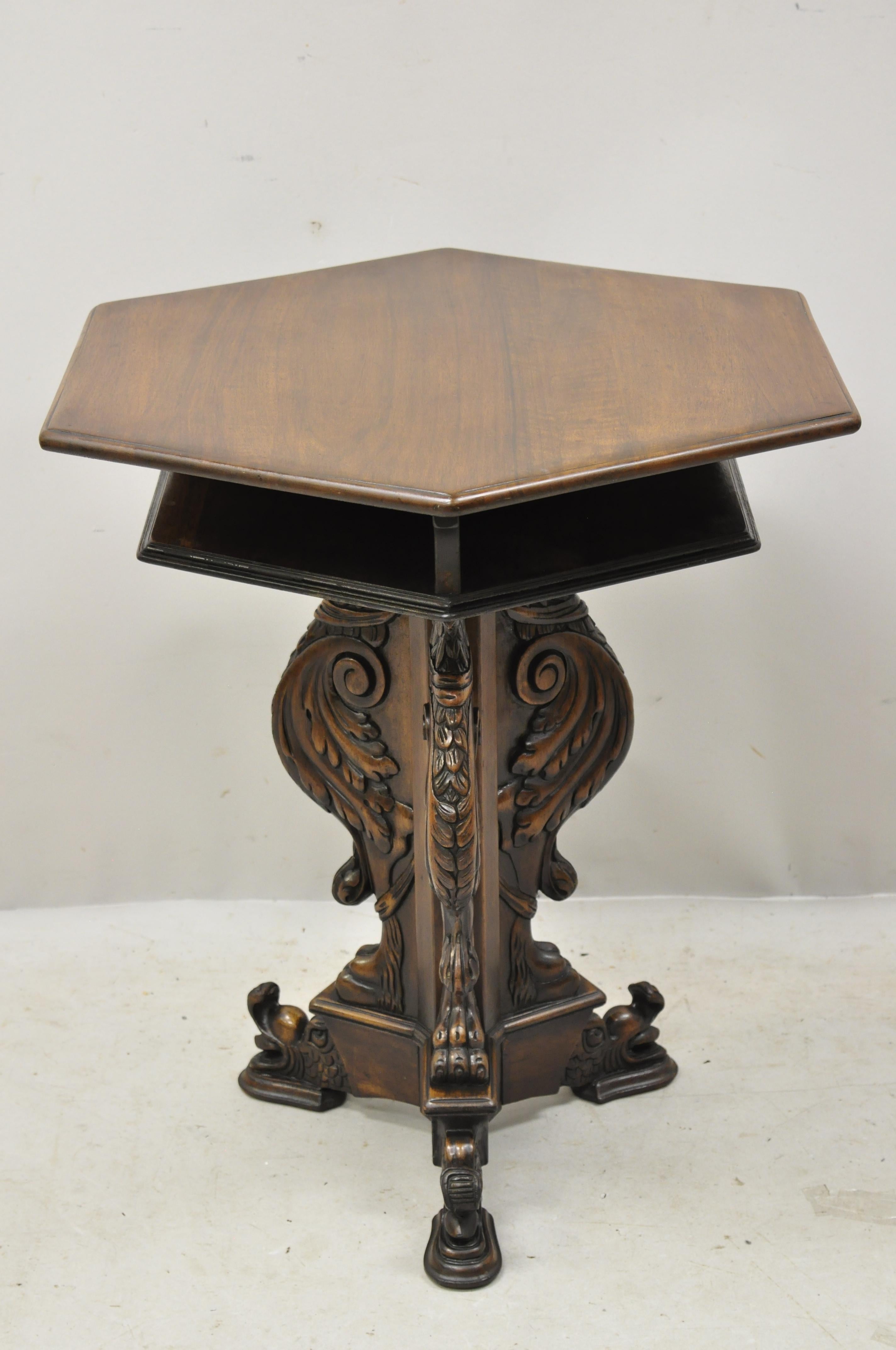 Antique Italian Renaissance figural Griffin carved walnut pedestal base occasional table. Item features figural carved griffin pedestal base, 3 storage cubbies, solid wood construction, beautiful wood grain, circa early 1900s. Measurements: 28.5