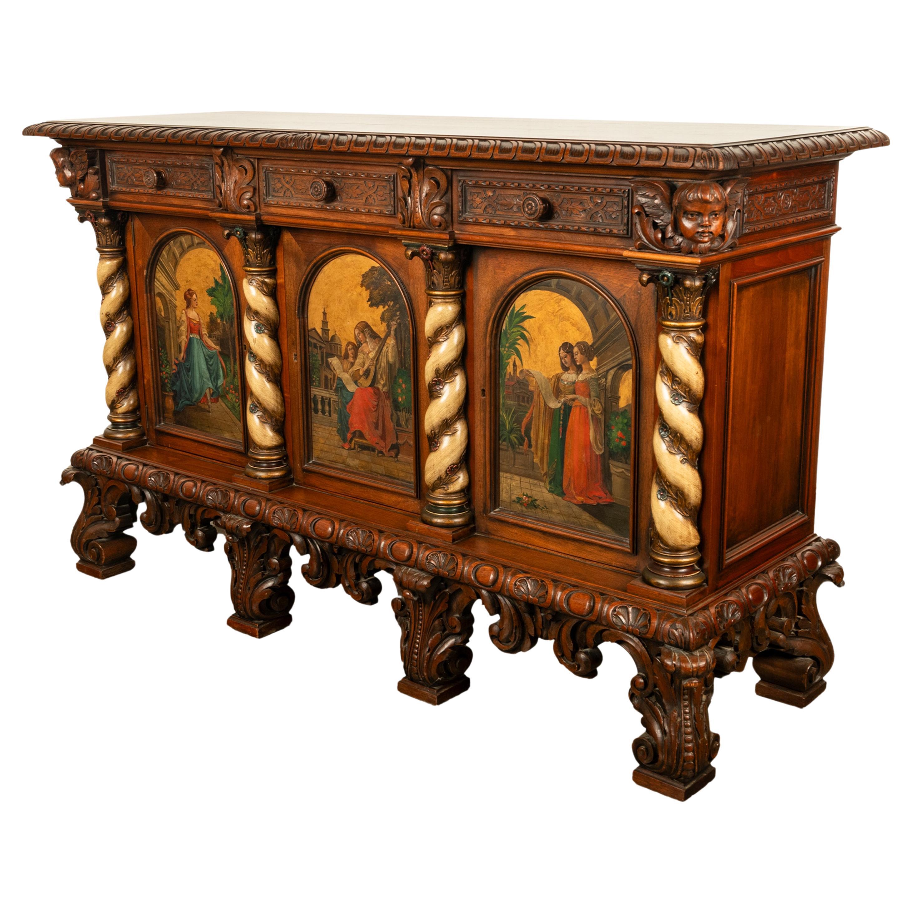 A fine antique Italian carved & handpainted polychrome walnut cassone cabinet, buffet, circa 1890.
This very elegant cabinet with a top boldly carved to the edge, below are three drawers carved with blind fretwork & turned pulls, the drawers are