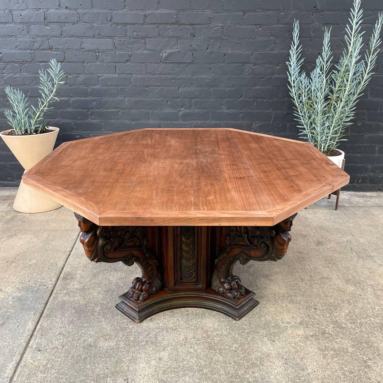 Antique Italian Renaissance style carved walnut dining table.