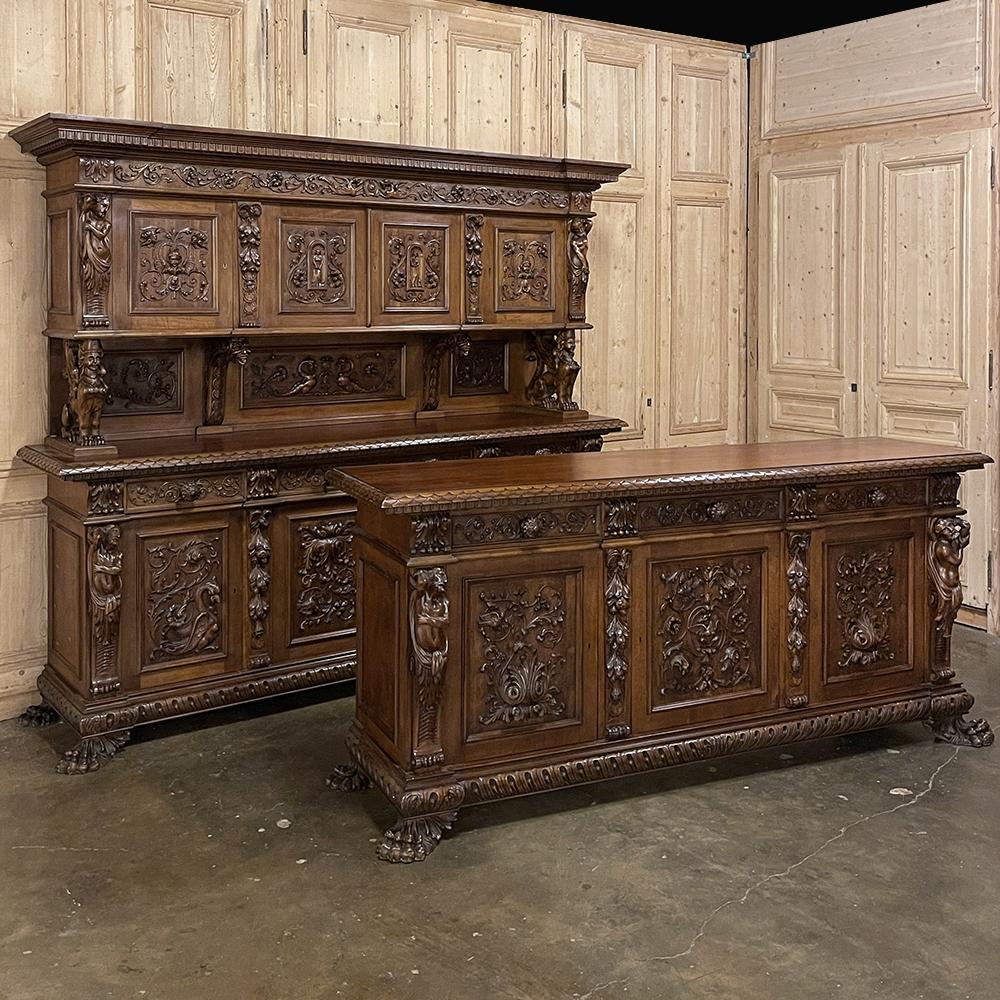 Antique Italian Renaissance Two-Piece Bar, Counter in Walnut will make an unforgettable statement in your family room or entertainment room! Sold as a set, it includes two virtually identical grand buffets with one including an exquisitely carved