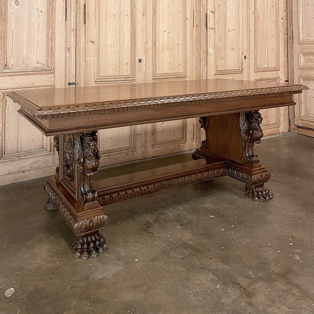Antique Italian Renaissance walnut desk ~ Table is an exquisite example of fine artistry and craftsmanship, rendered in beautiful indigenous wood! The spacious top is framed by a two-tiered edging consisting of fishscale over a variation of dentil