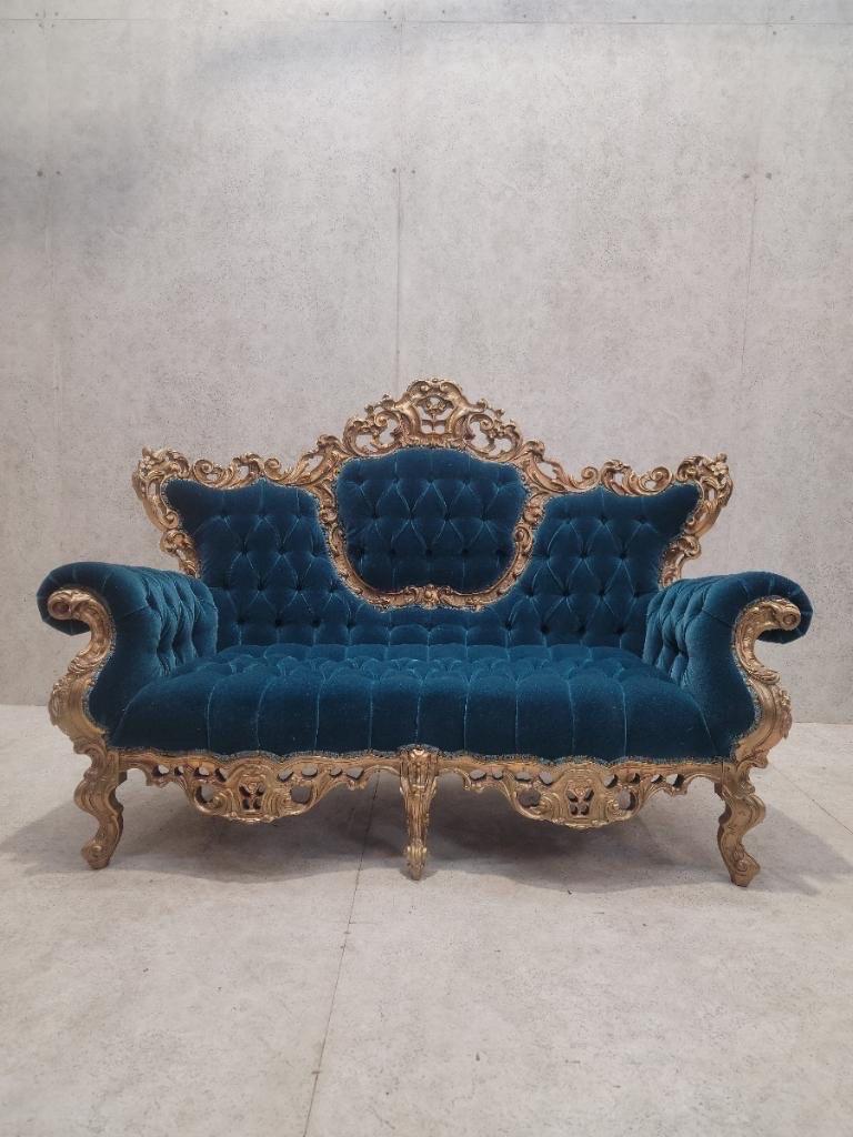 Antique Italian Rococo Carved Tufted Wedding Sofa Newly Upholstered in a Teal Mohair

This is a fabulous plush teal tufted sofa/settee that we fully brought back to life.

Stunning Italian rococo style heavily carved gold gilt wedding sofa/settee