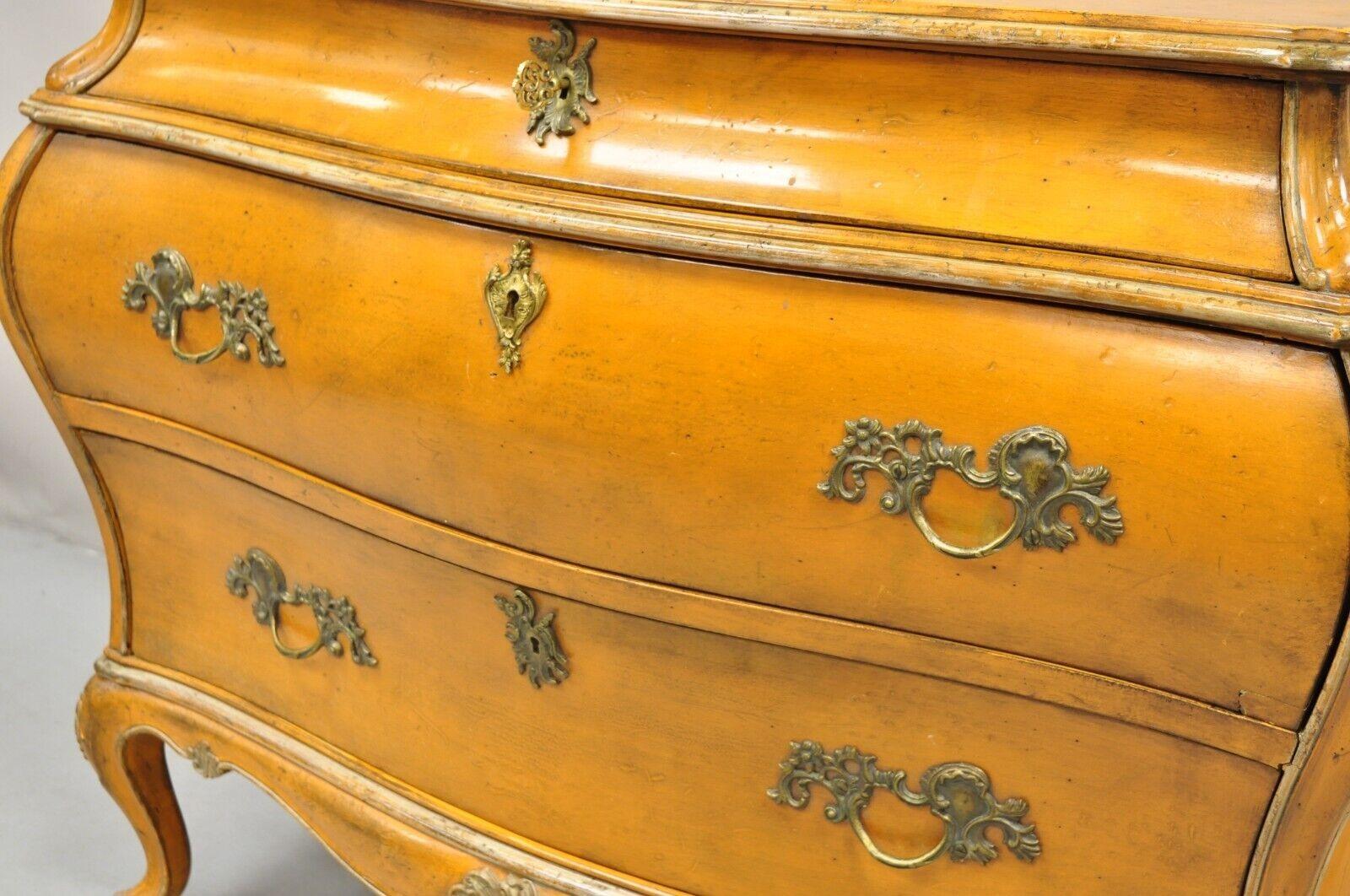 Antique Italian Rococo Orange Painted Bombe Commode, Chest of Drawers. Item features Original orange distress painted finish, shapely bombe form, quality dovetailed construction to rear, ornate brass hardware, very unique chest of drawers Circa
