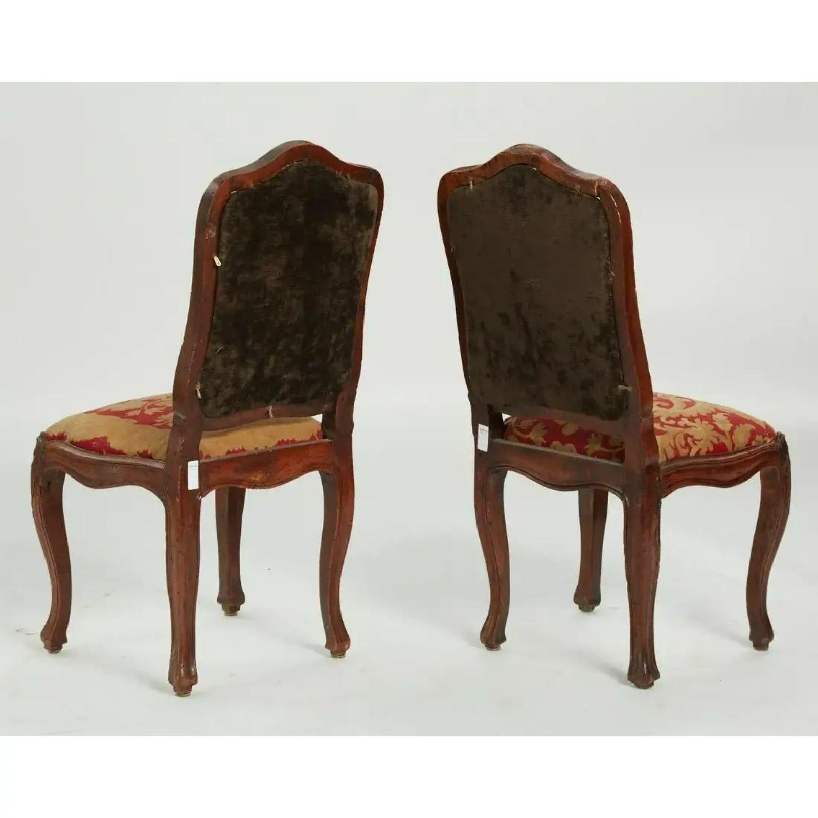 Antique 18th century Italian walnut Rococo side chairs

Additional information: 
Materials: walnut
Color: red
Period: 18th century
Styles: Italian, Rococo
Number of seats: 2
Item type: vintage, antique or pre-owned
Dimensions: 20