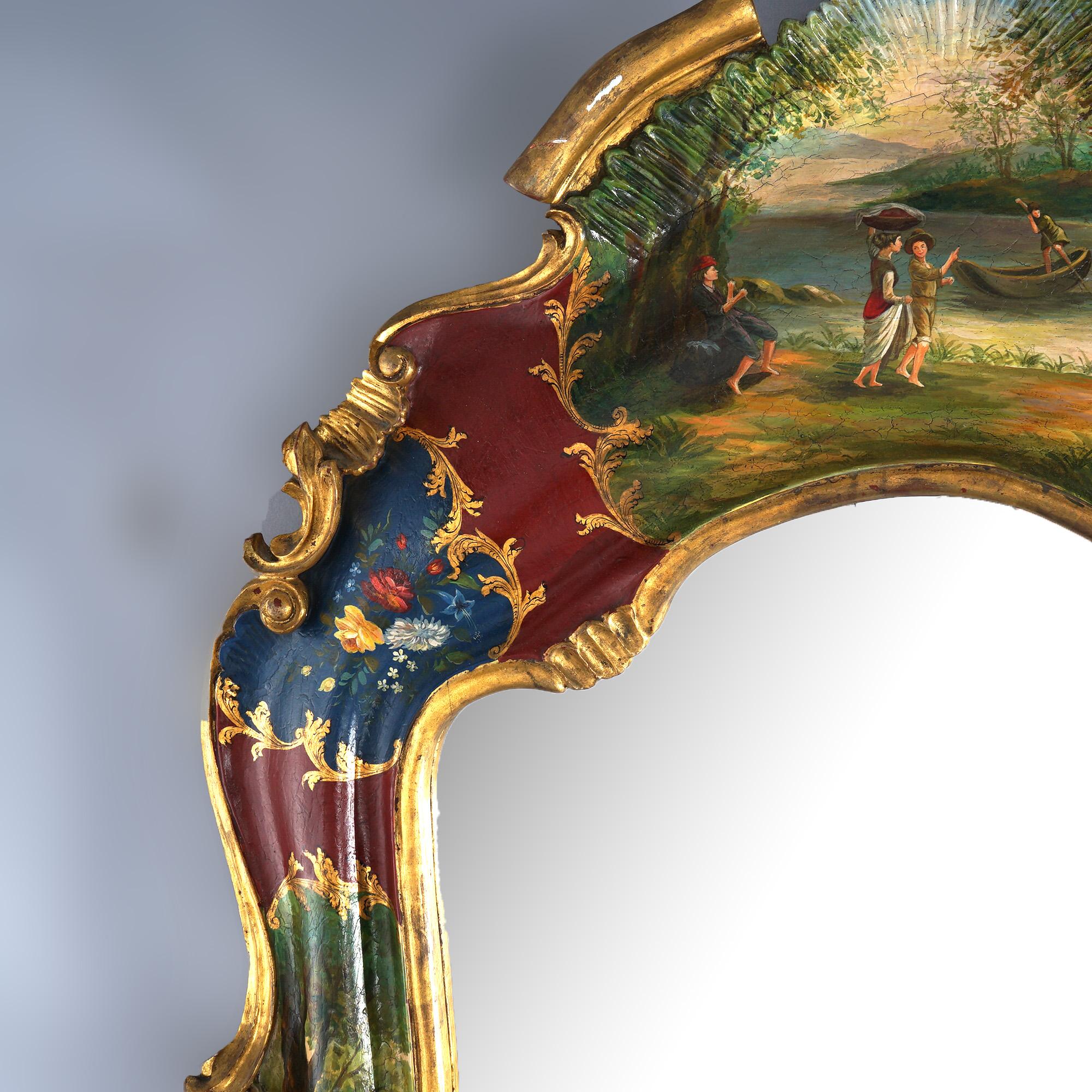***Ask About Reduced In-House Delivery Rates - Reliable Professional Service & Fully Insured***
Antique Italian Rococo Style Venetian Decorated Shaped Wall Mirror with Carved Crest over Landscape Genre Scenes, Floral Elements and Heavily Gilt