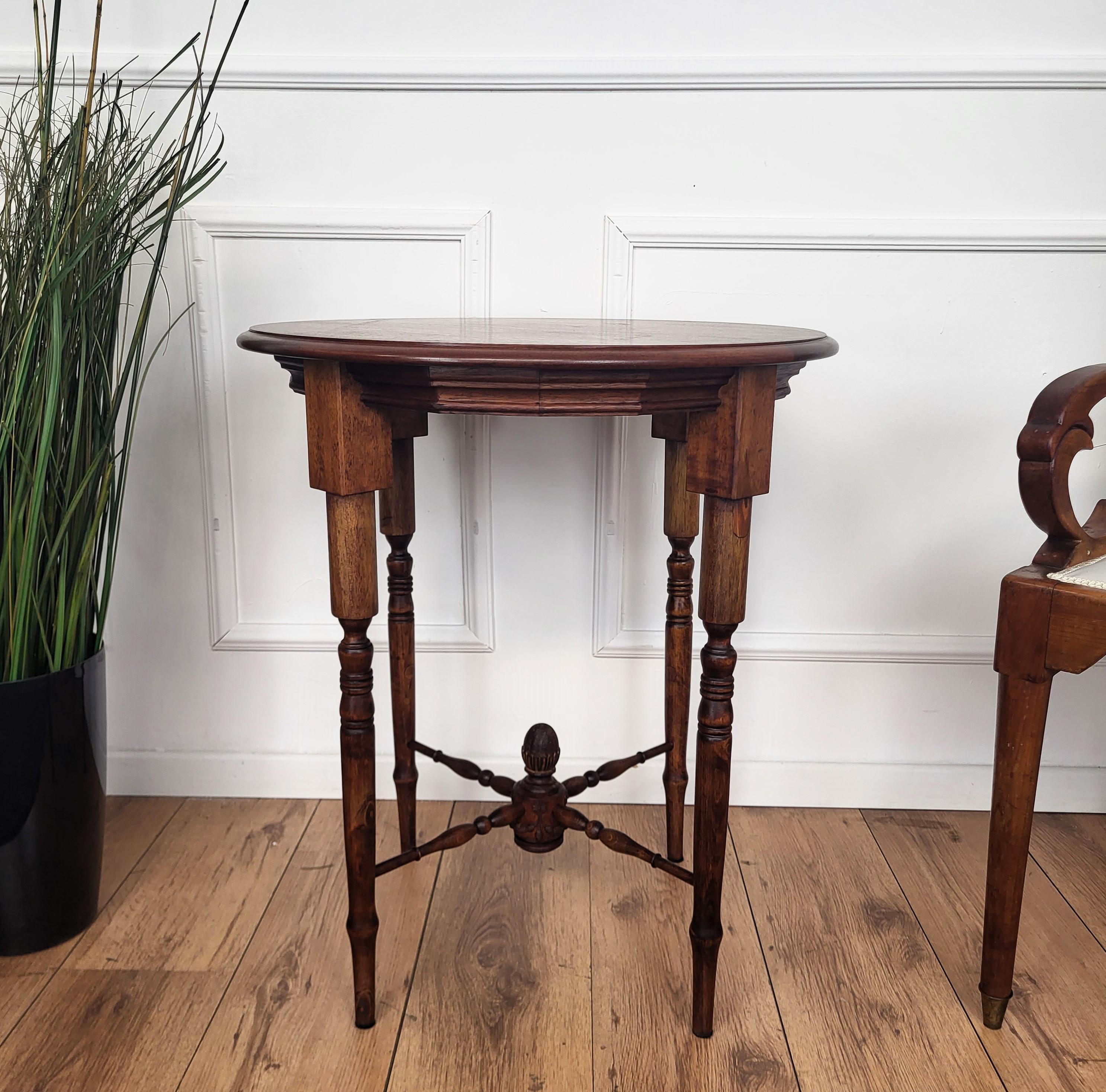 Wood Antique Italian Round Walnut Side Table with Carved Bun Stretcher For Sale