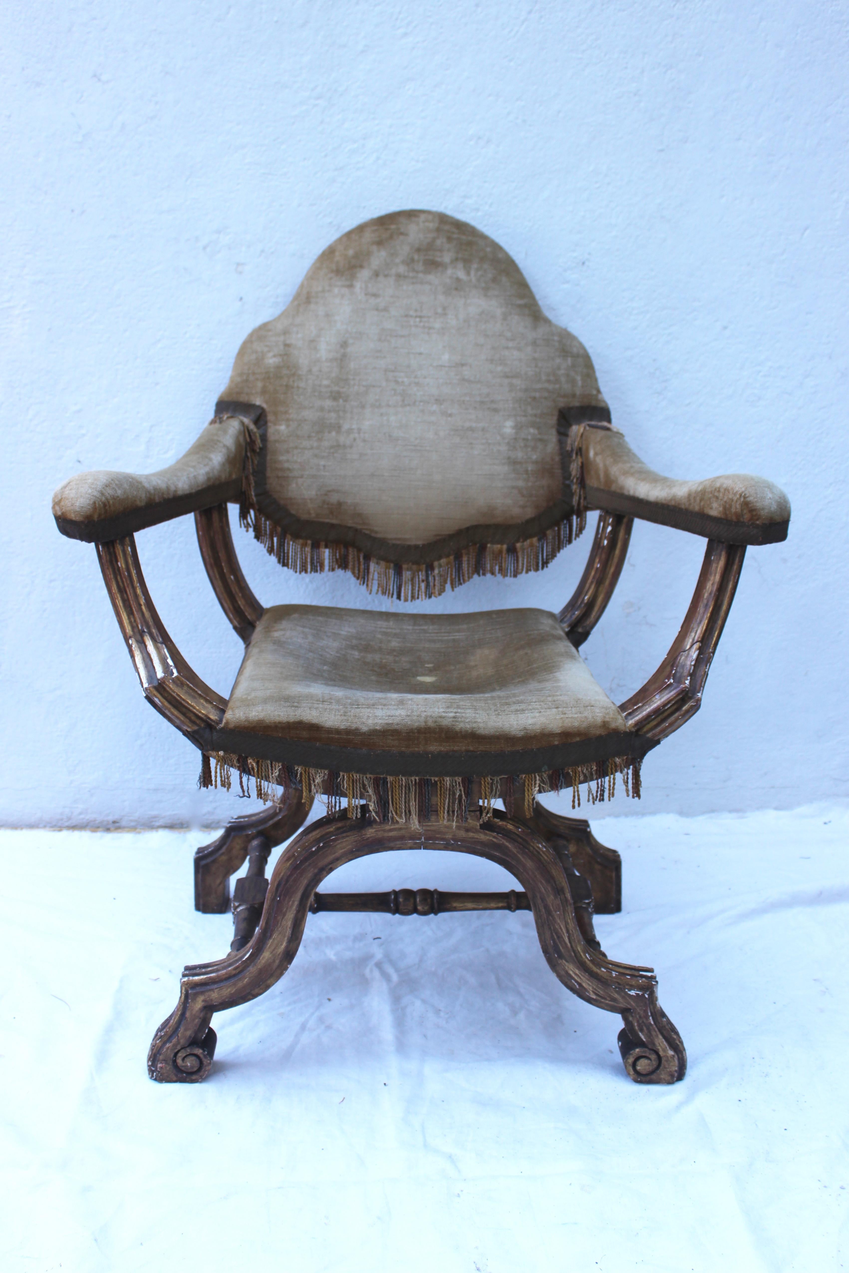 19th century Italian Savonarola armchair with original velvet upholstery with fringe. 

Measures: Seat height 17