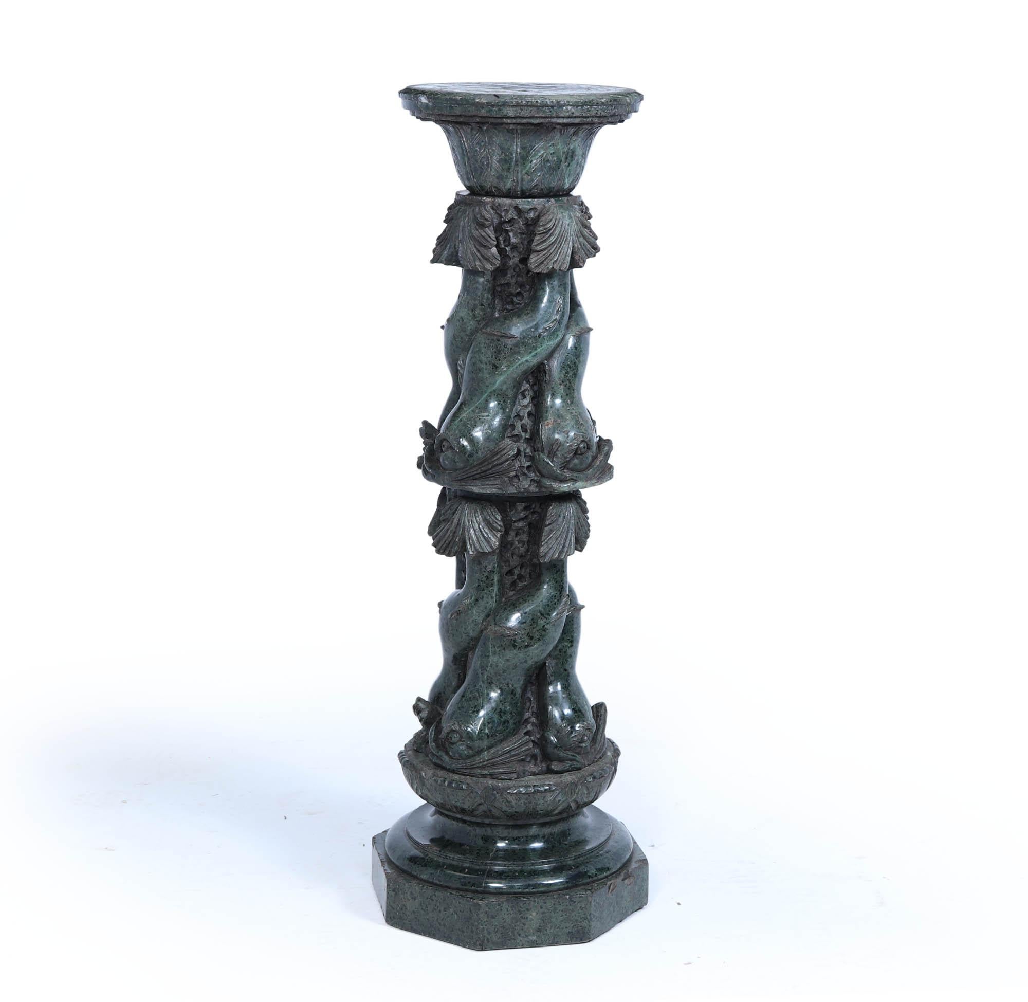 Antique Italian Marble Pedestal 
A serpentine marble pedestal stand produced around 1880 with carved fish and foliate, age related wear with a few chips and losses as to be expected with age

Age: 1880

Style: Renascence

Origin : Italy

Material: