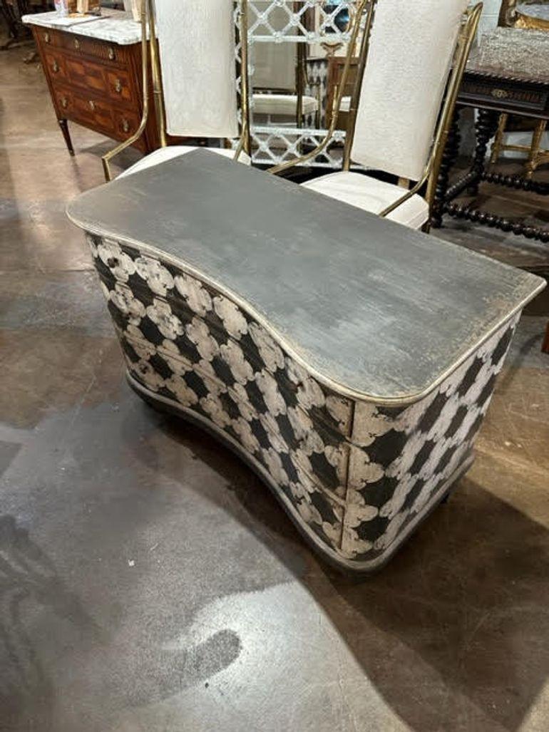 Decorative antique Italian shaped front black and white chest. Painted in an interesting geometric pattern. Three drawers for storage as well. Lovely!